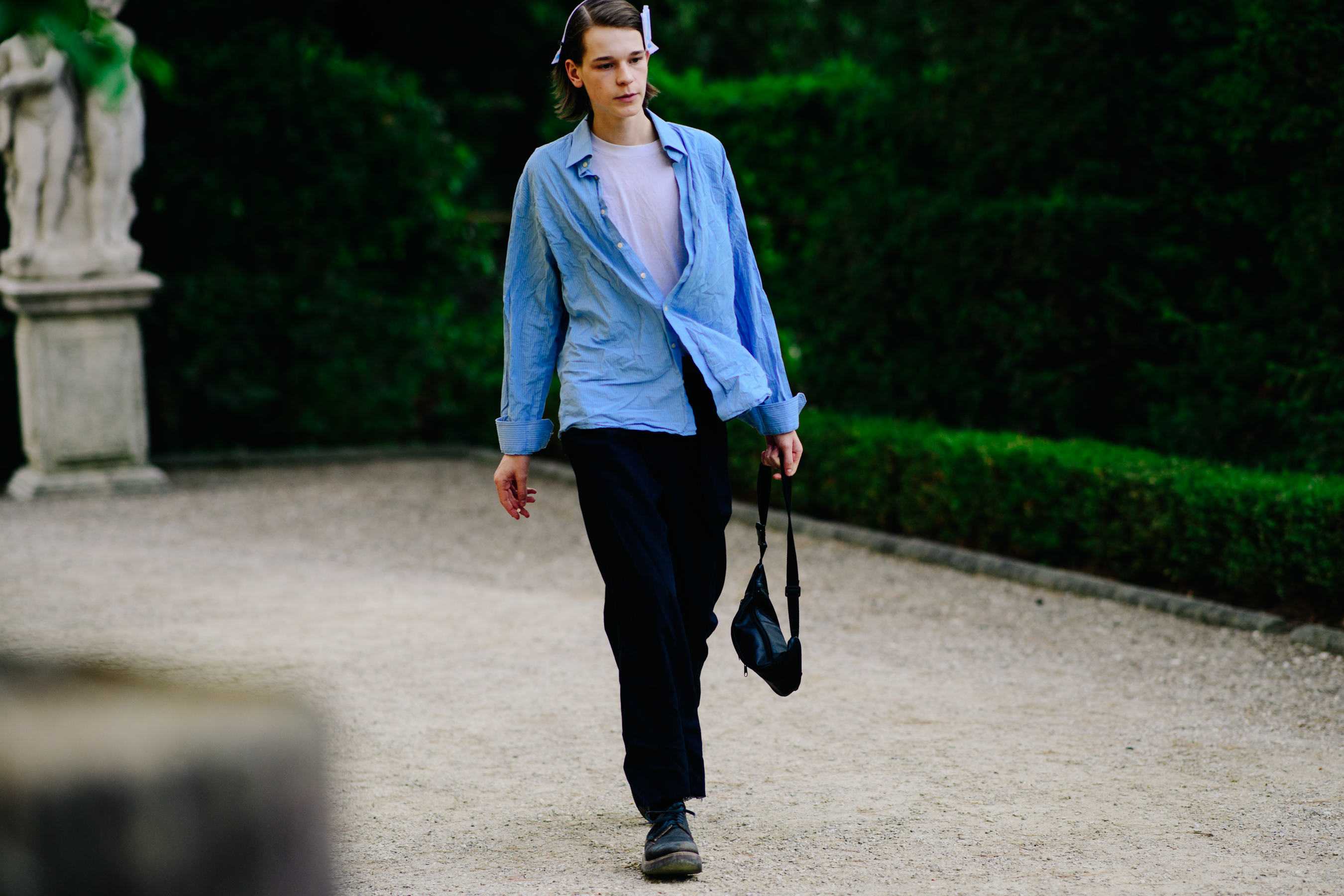 Male model walking before a show