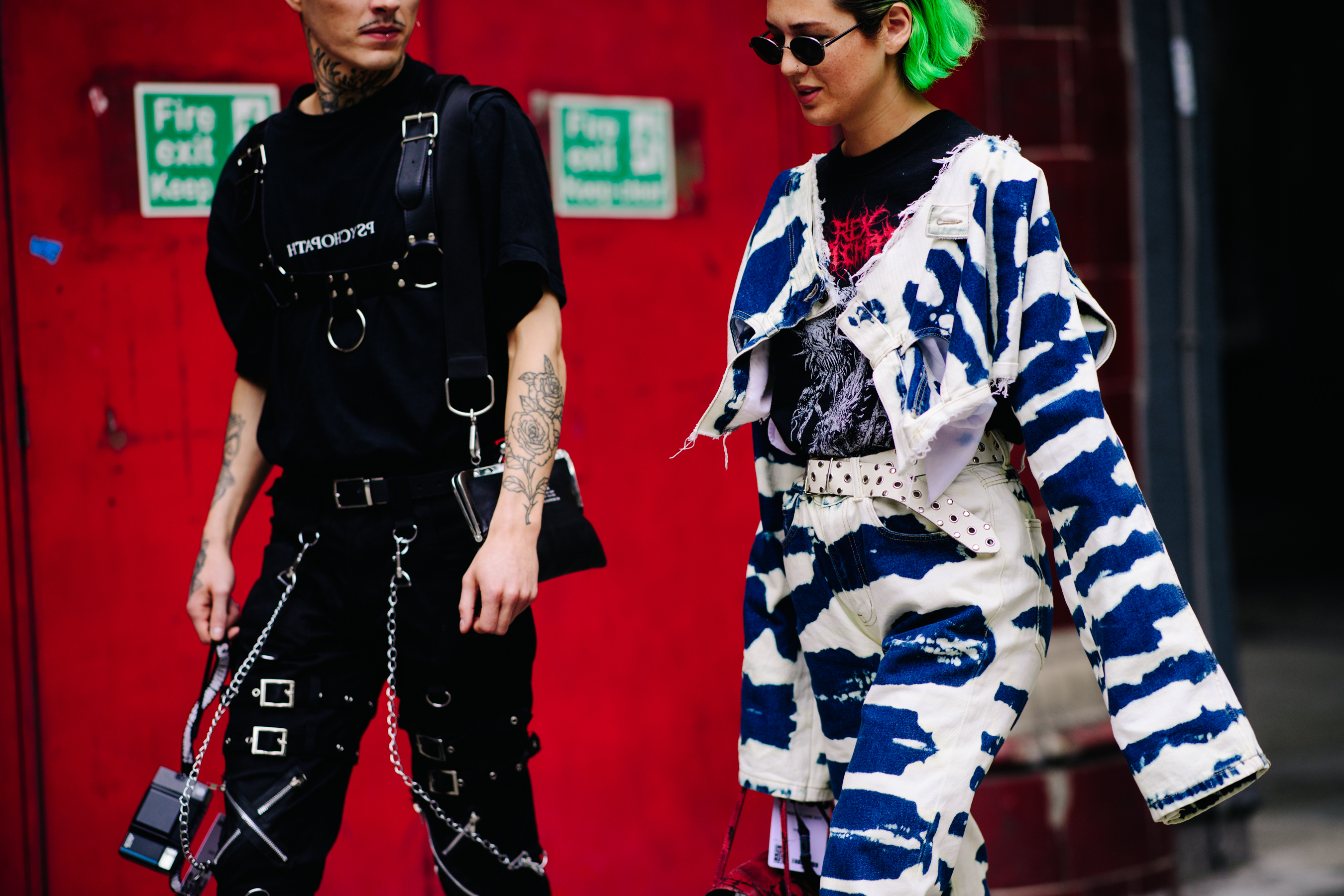 Man and woman wearing contrasting outfits