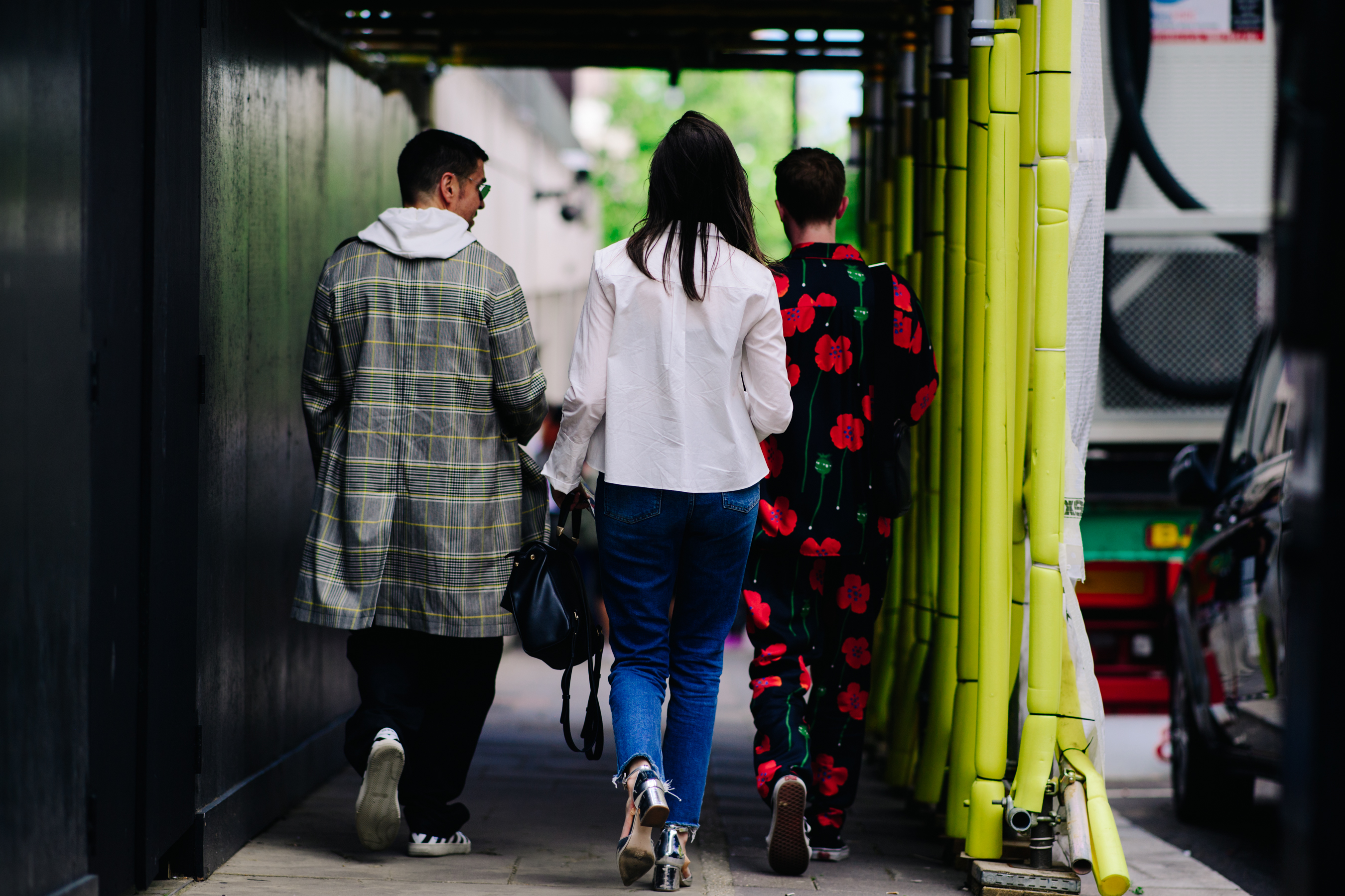 People walking outside a show in London
