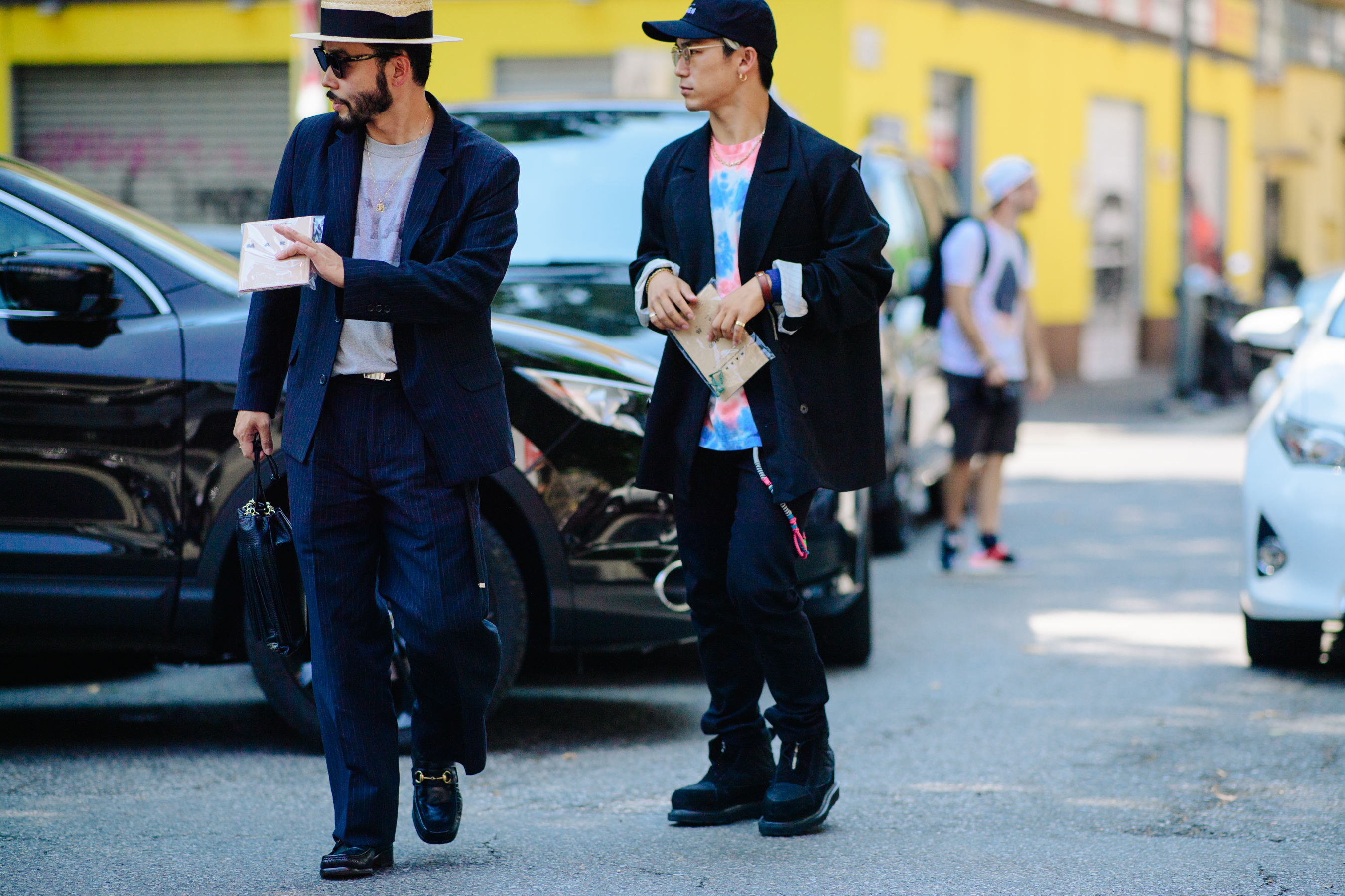 Man wearing a suit and Gucci shoes