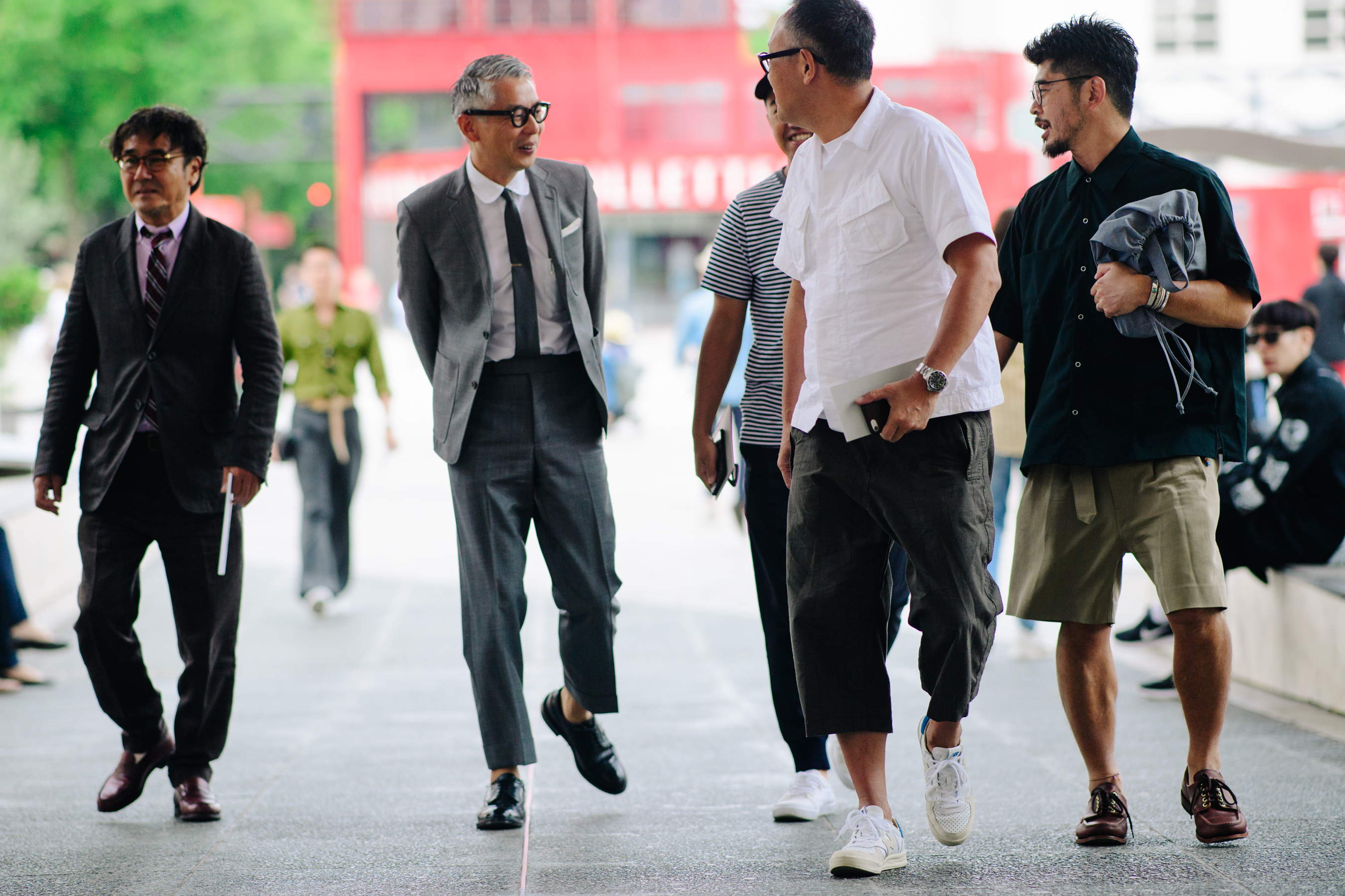 Several men walking on the street