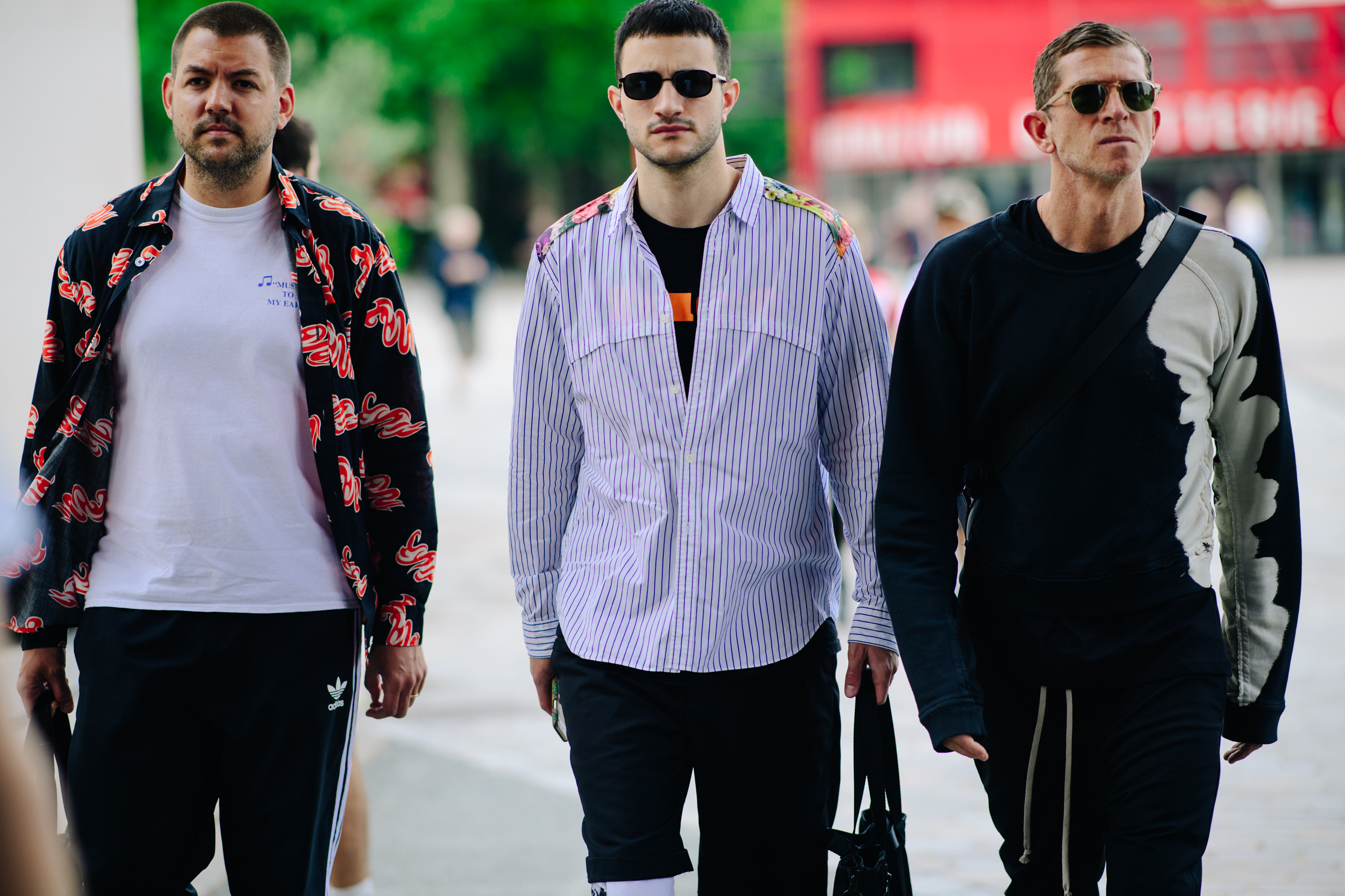 Man wearing black Adidas trackpants