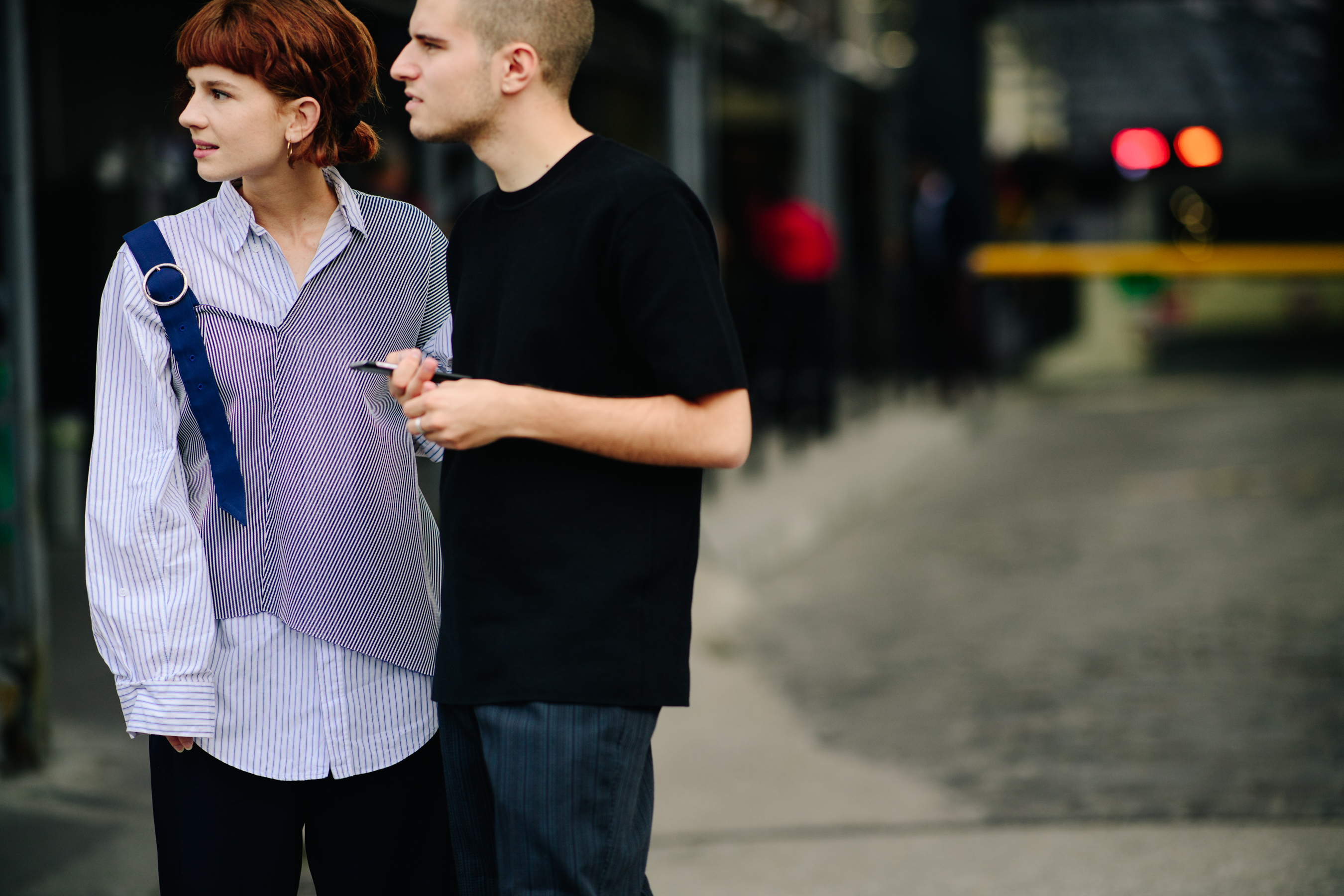 Girl and boy staying on the street
