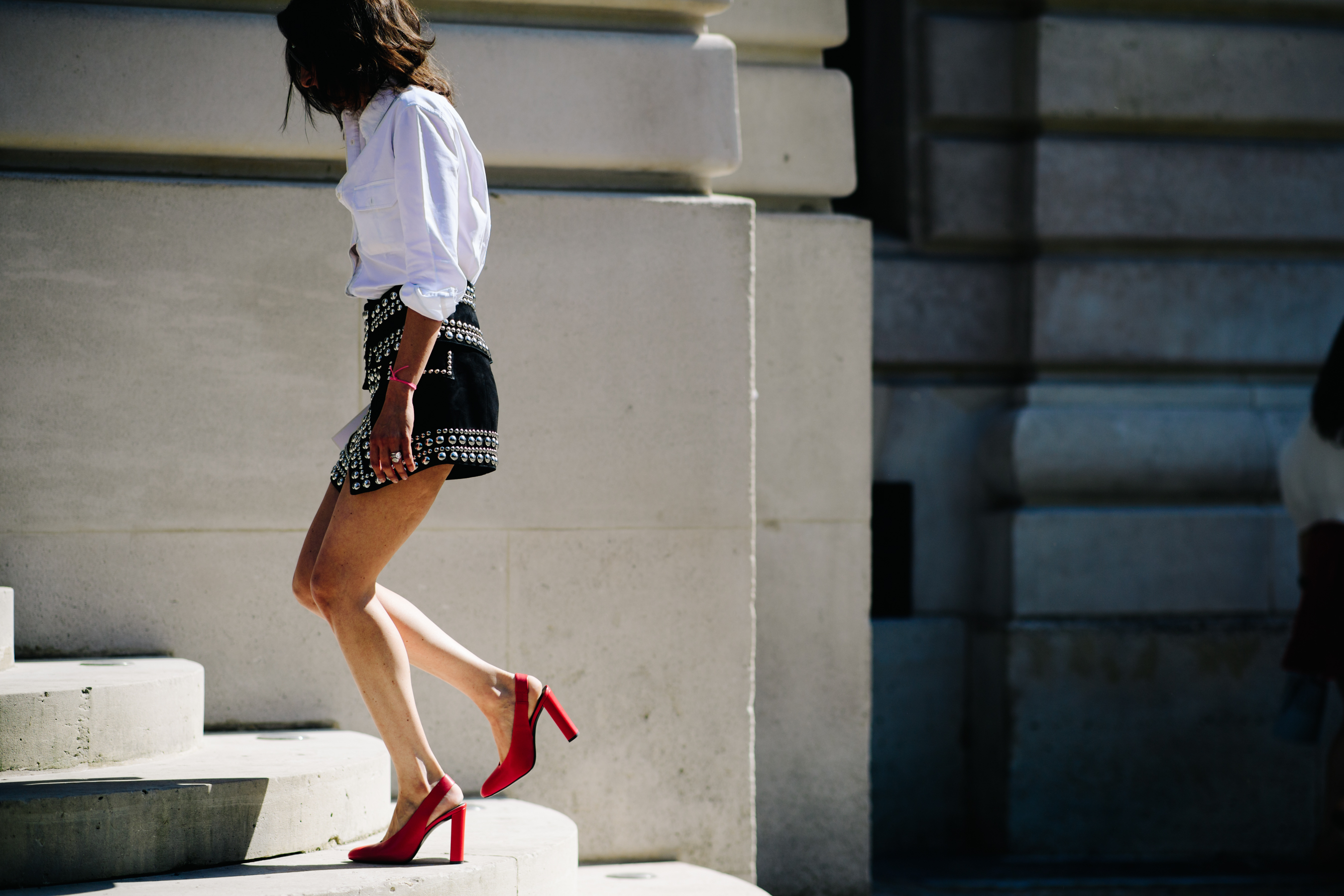 Woman wearing a studded mini-skirt