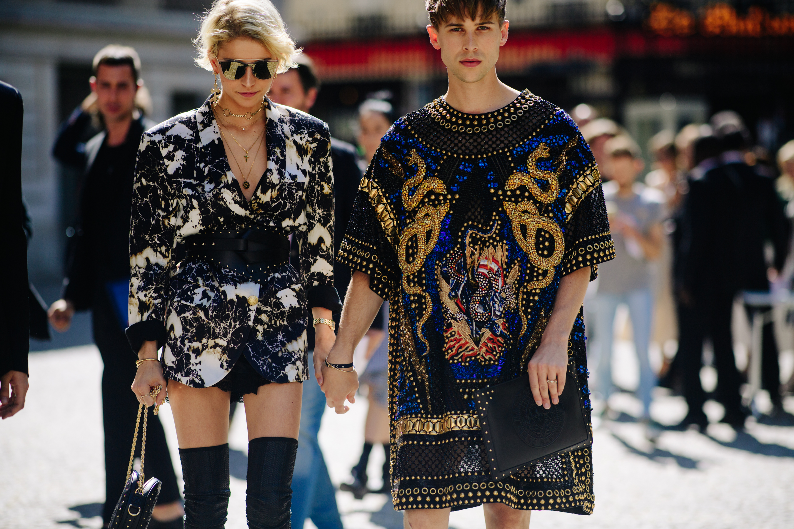 Woman and man wearing embroidered tops