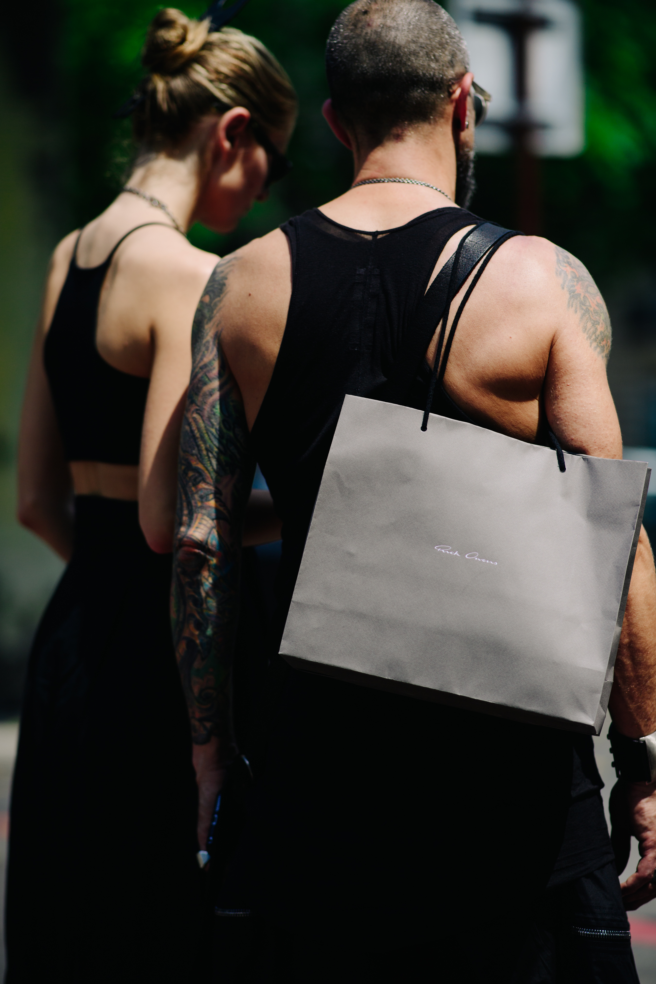 People wearing black outfits