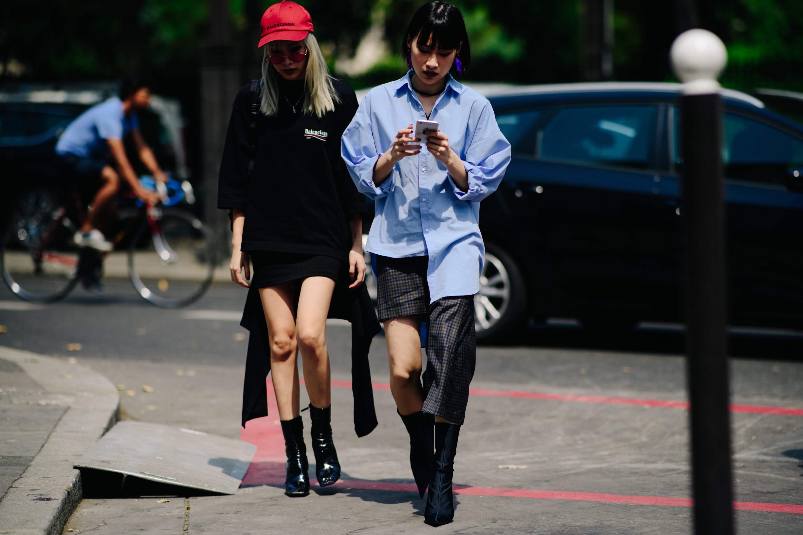 Two girls wearing Balenciaga garments