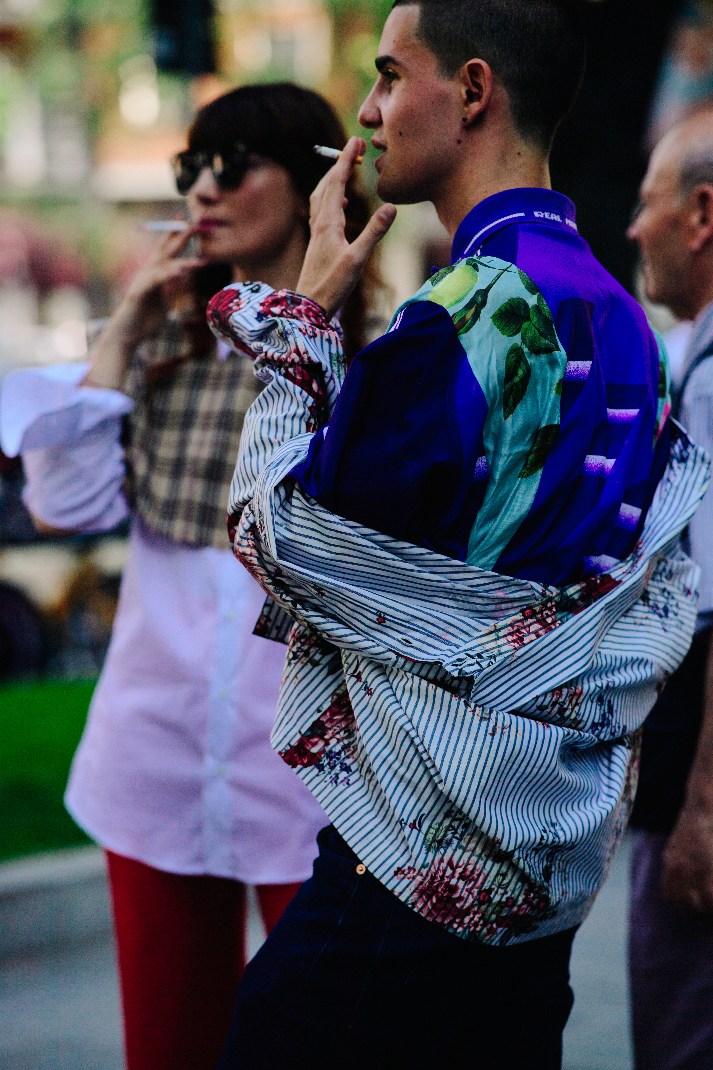 Boy and girl wearing colourful outfits
