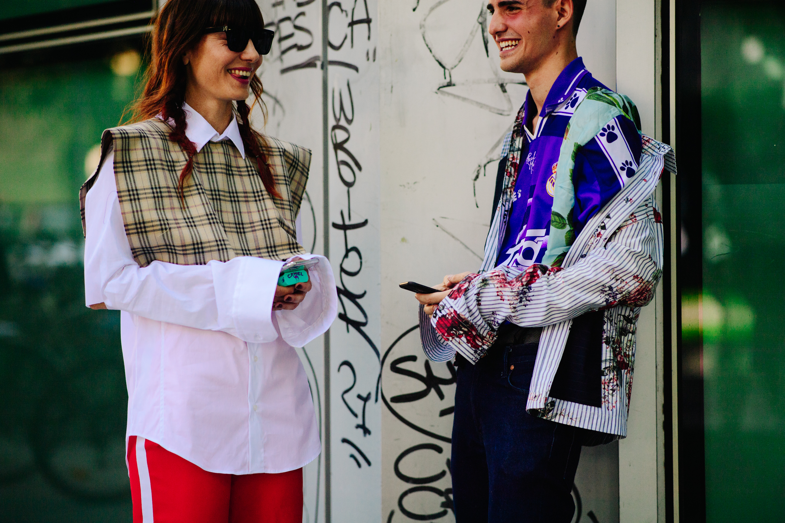 Boy and girl wearing colourful outfits