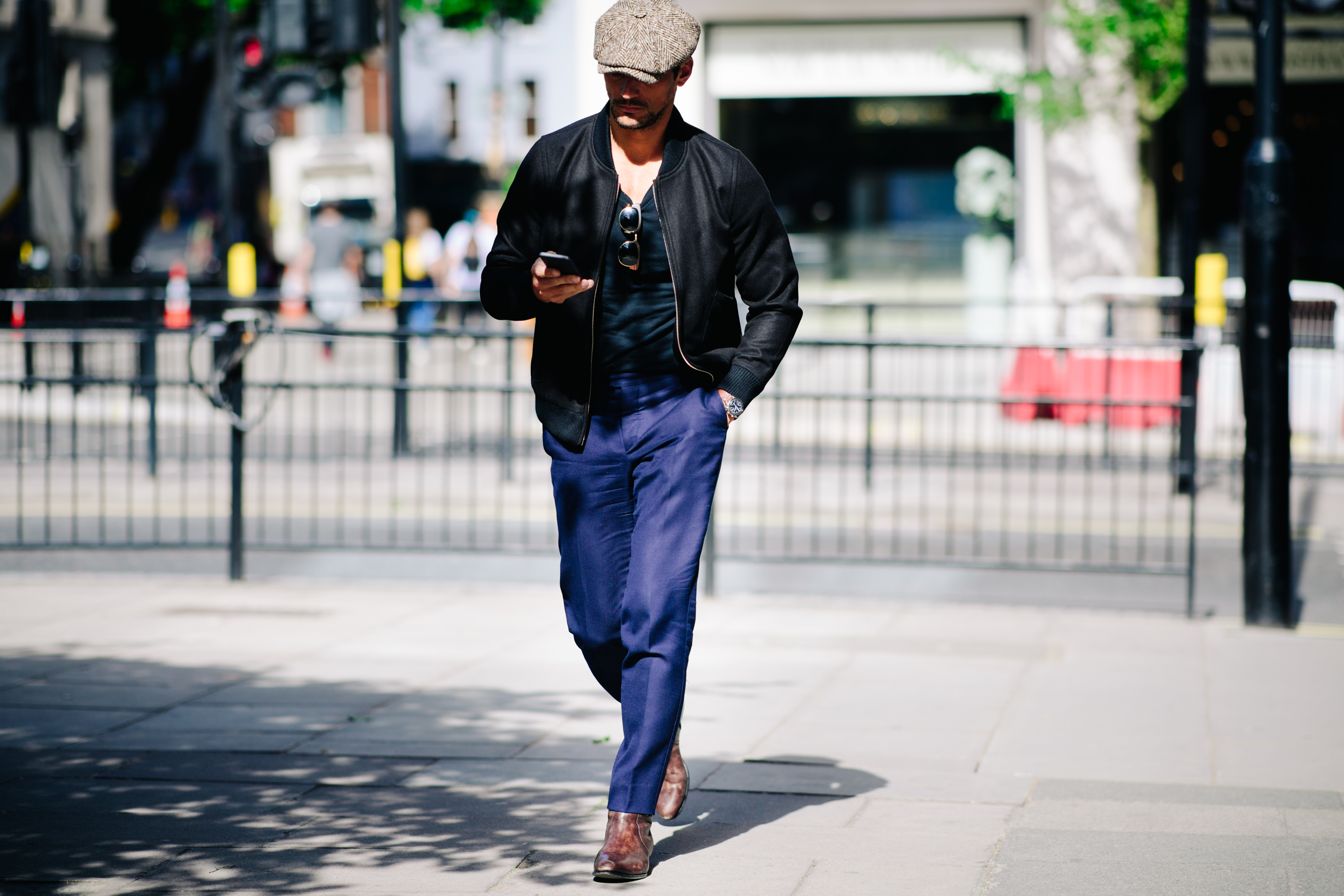 Man wearing dark blue trousers