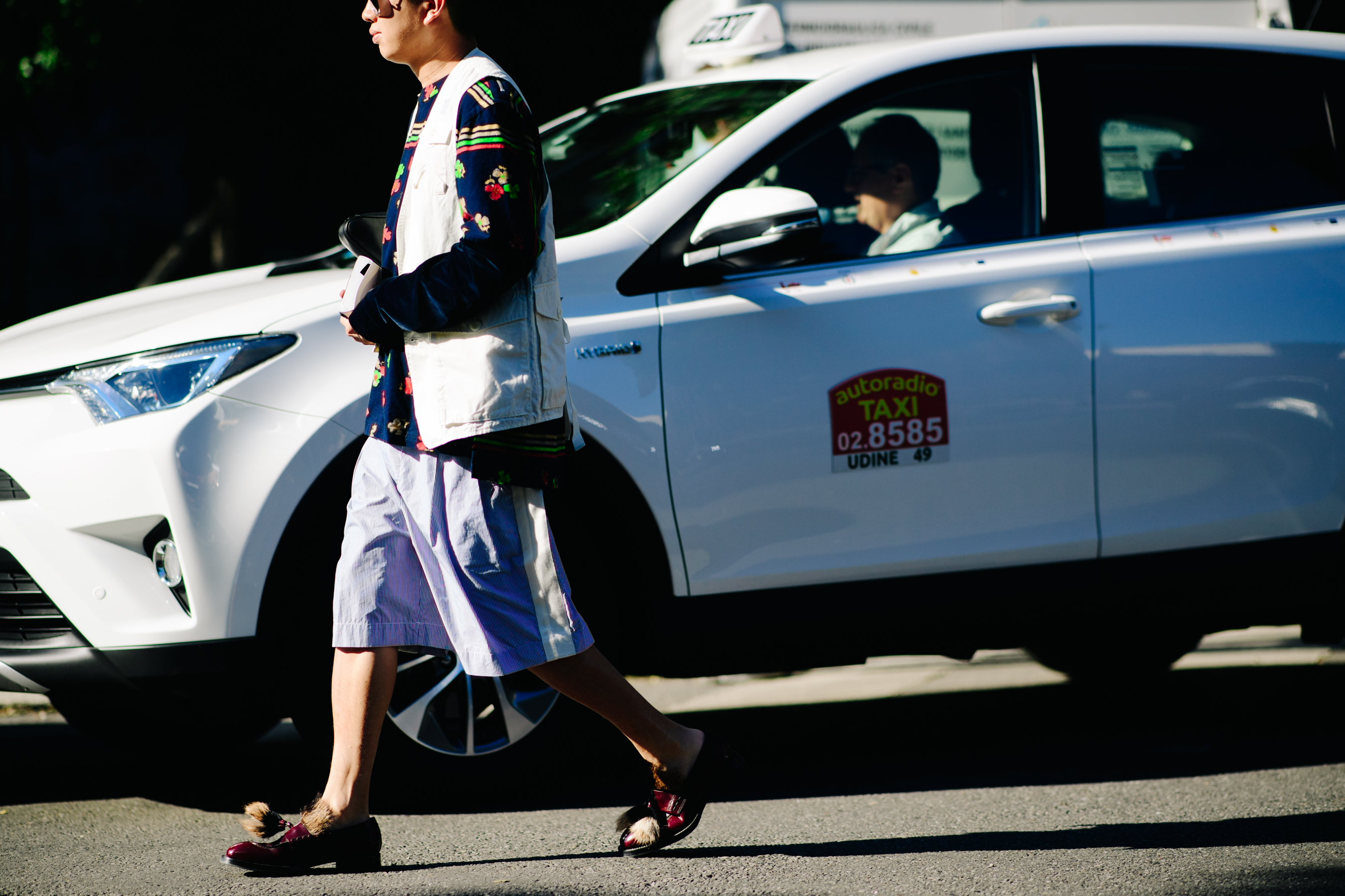 Stylist wearing beach striped shorts