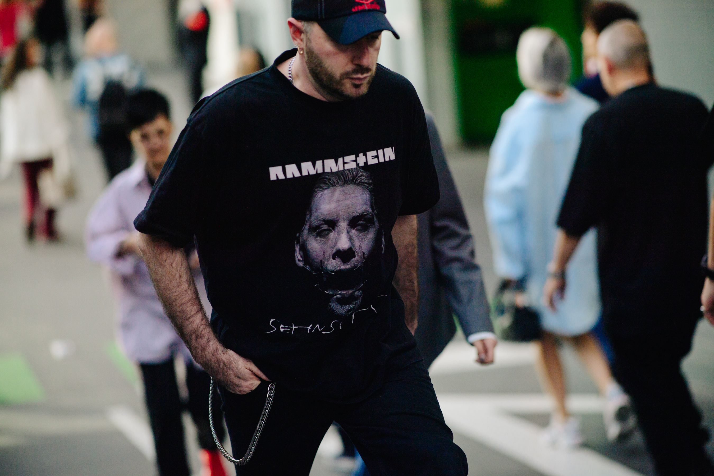 Fashion designer wearing an Umbro cap