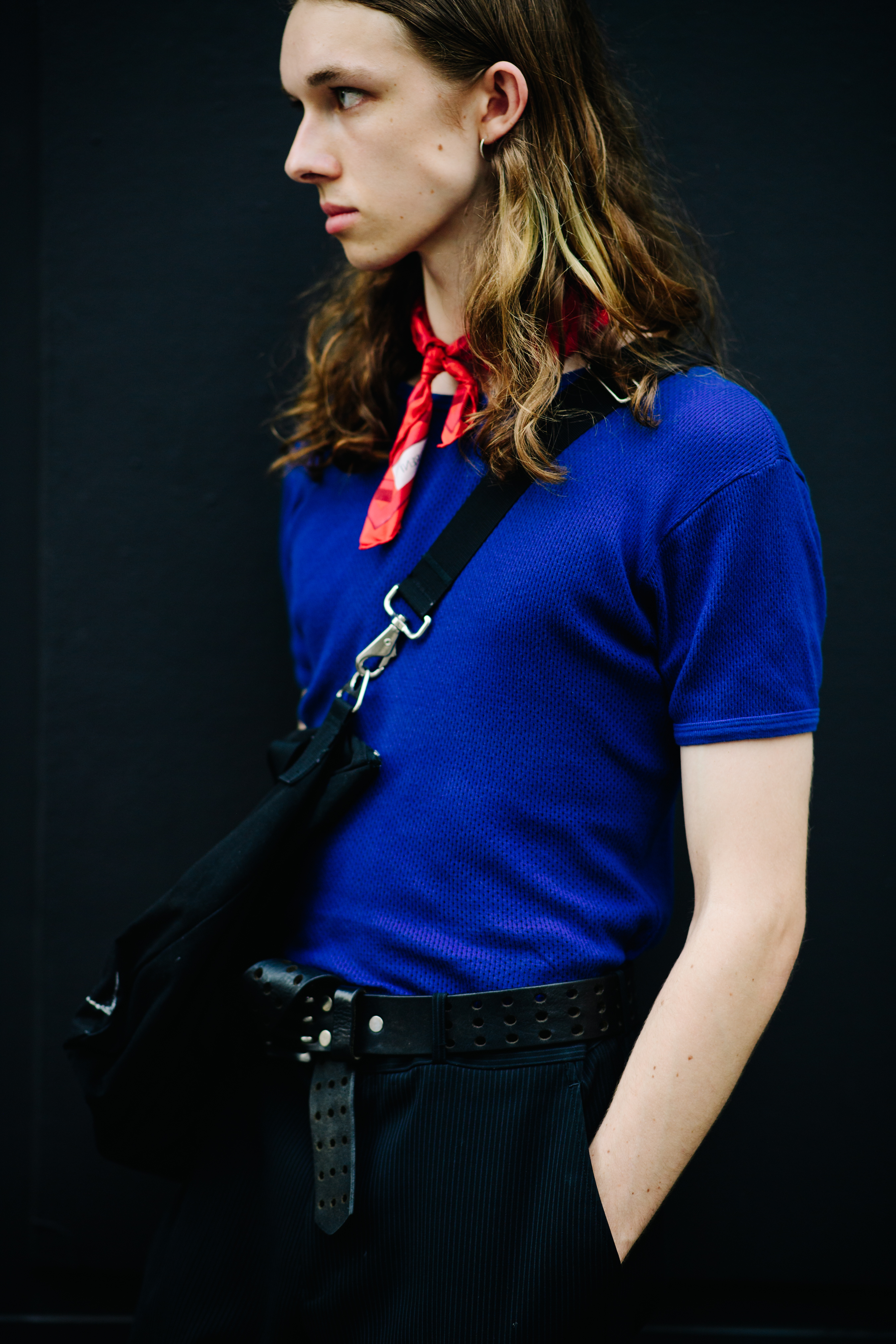 Male model wearing a blue t-shirt