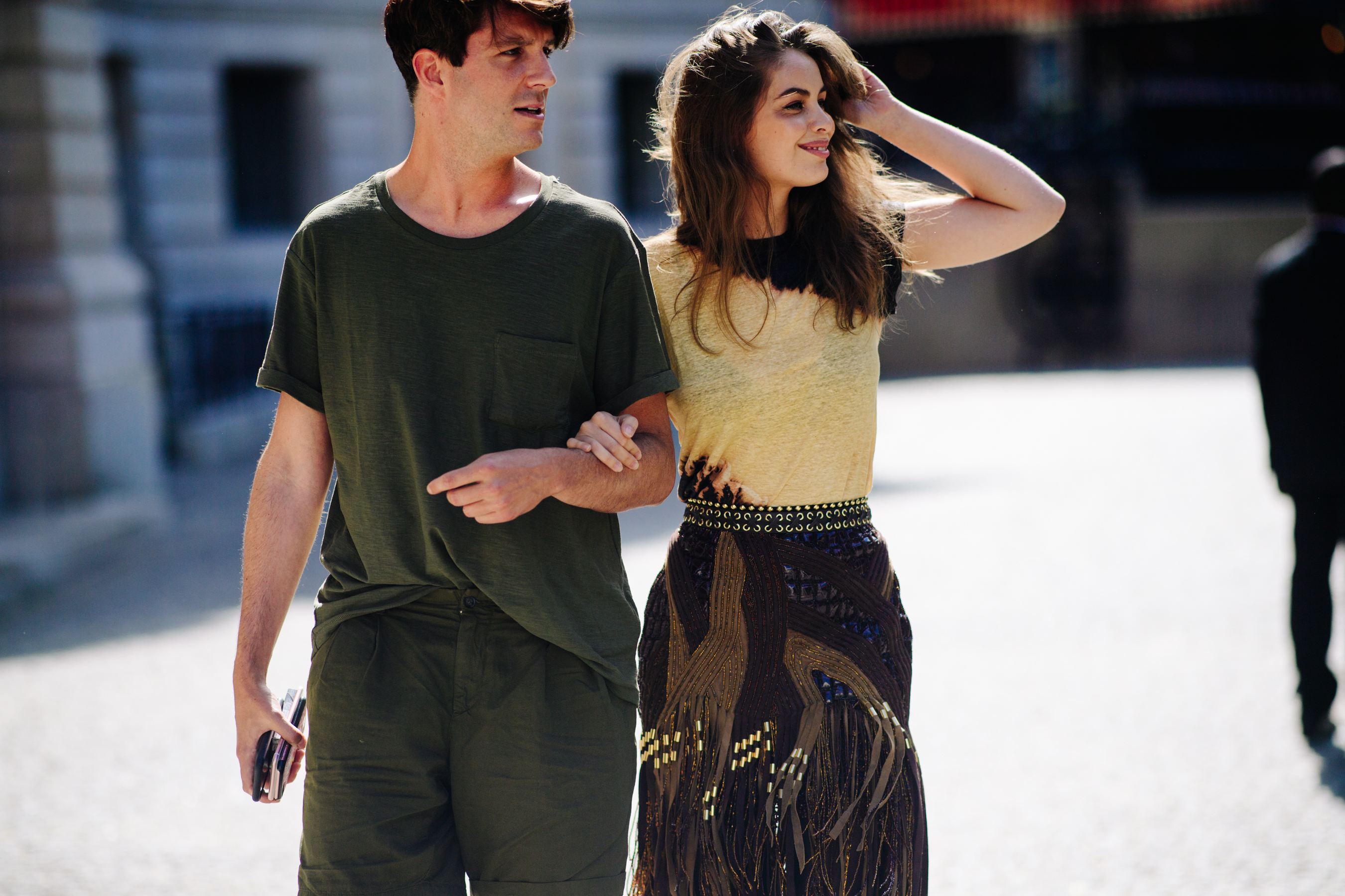 Couple holding hands before a show