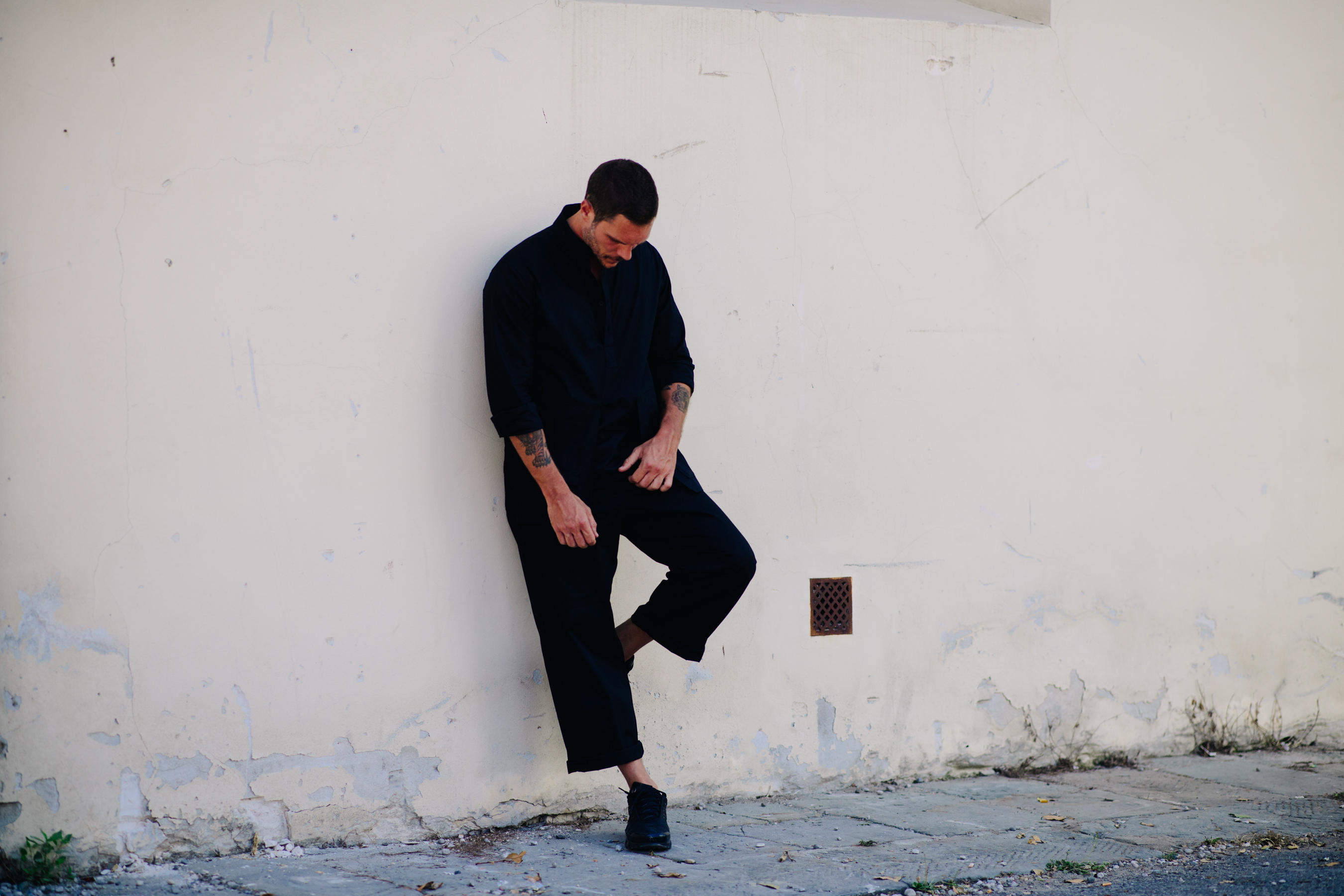 Man wearing black outfit