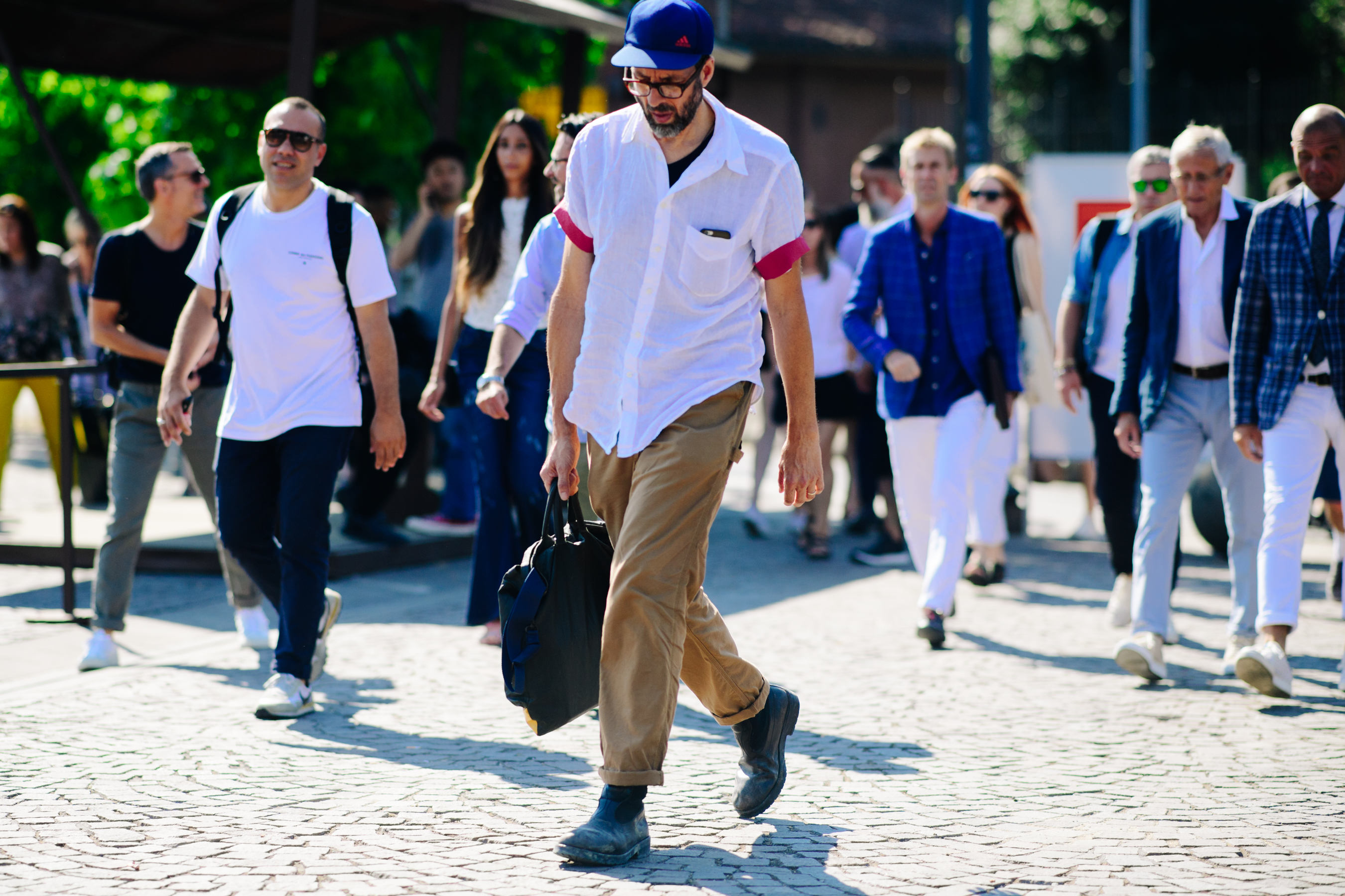 Man wearing cargo pants and shirt