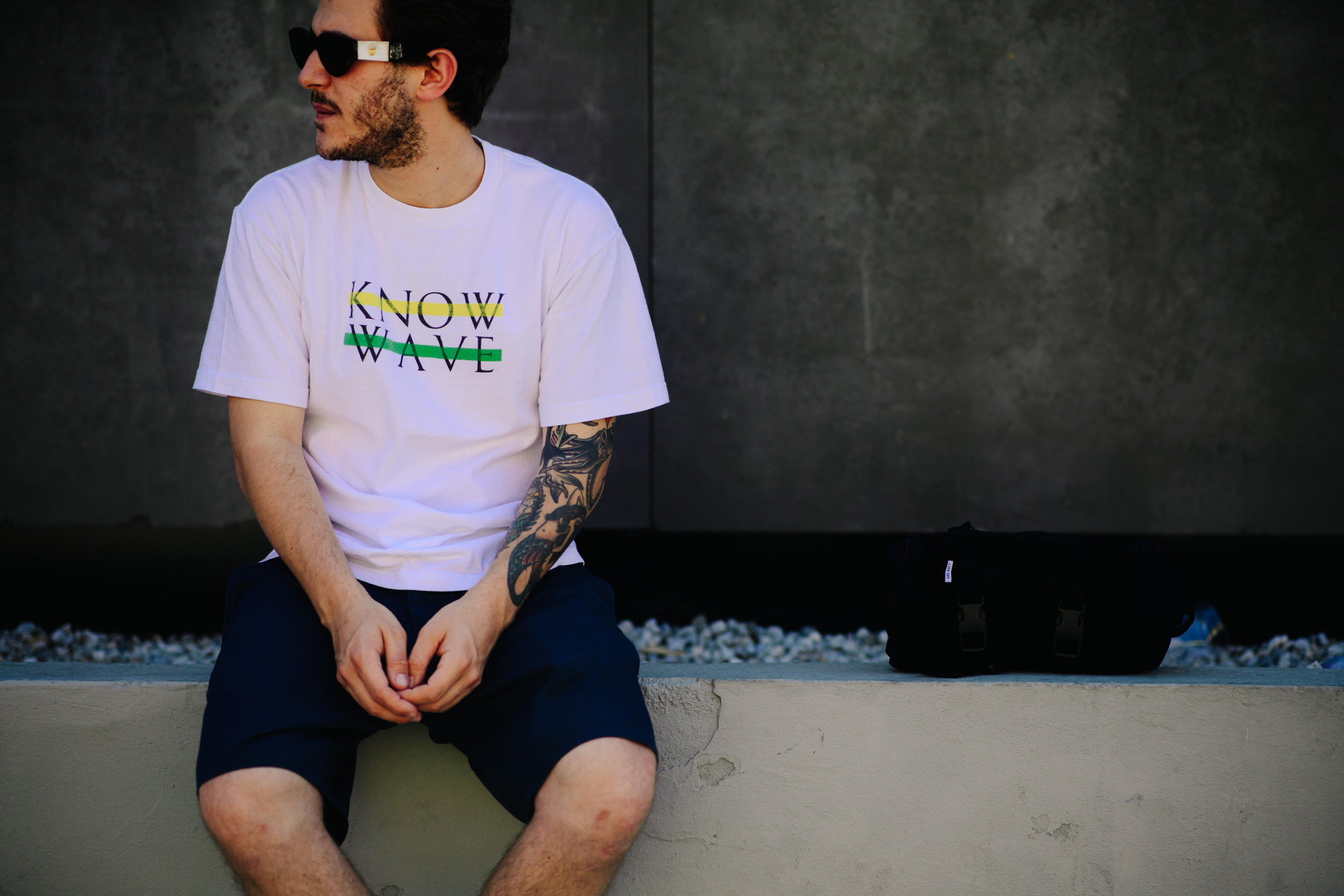 Man wearing Know Wave t-shirt
