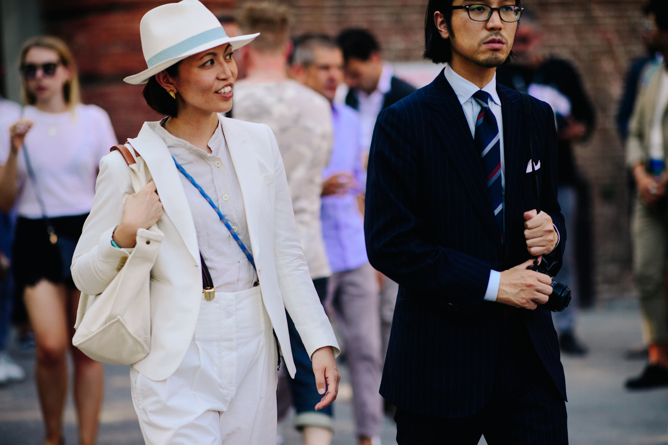 Man and woman wearing suits
