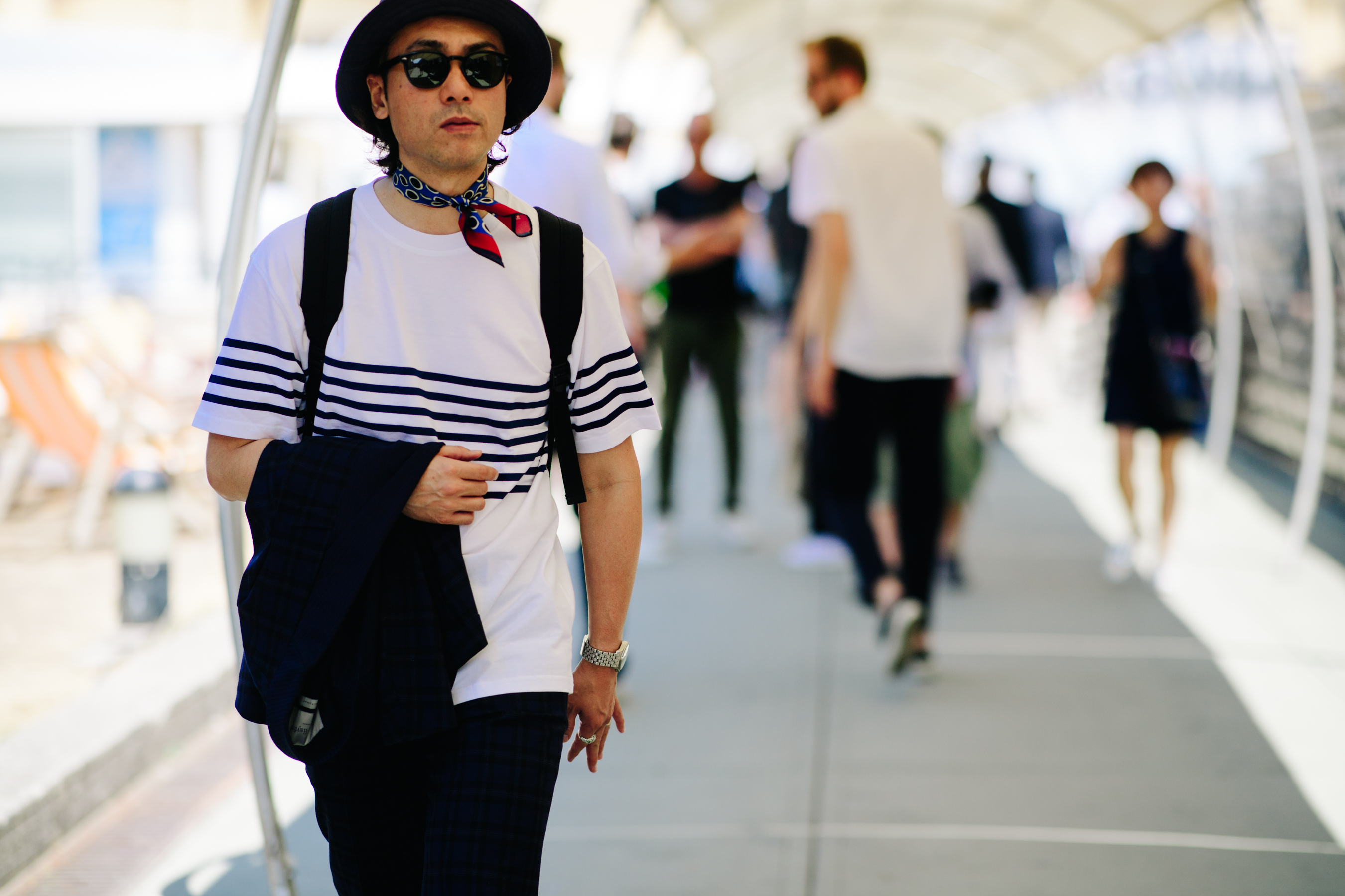 Man wearing a white striped t-shirt