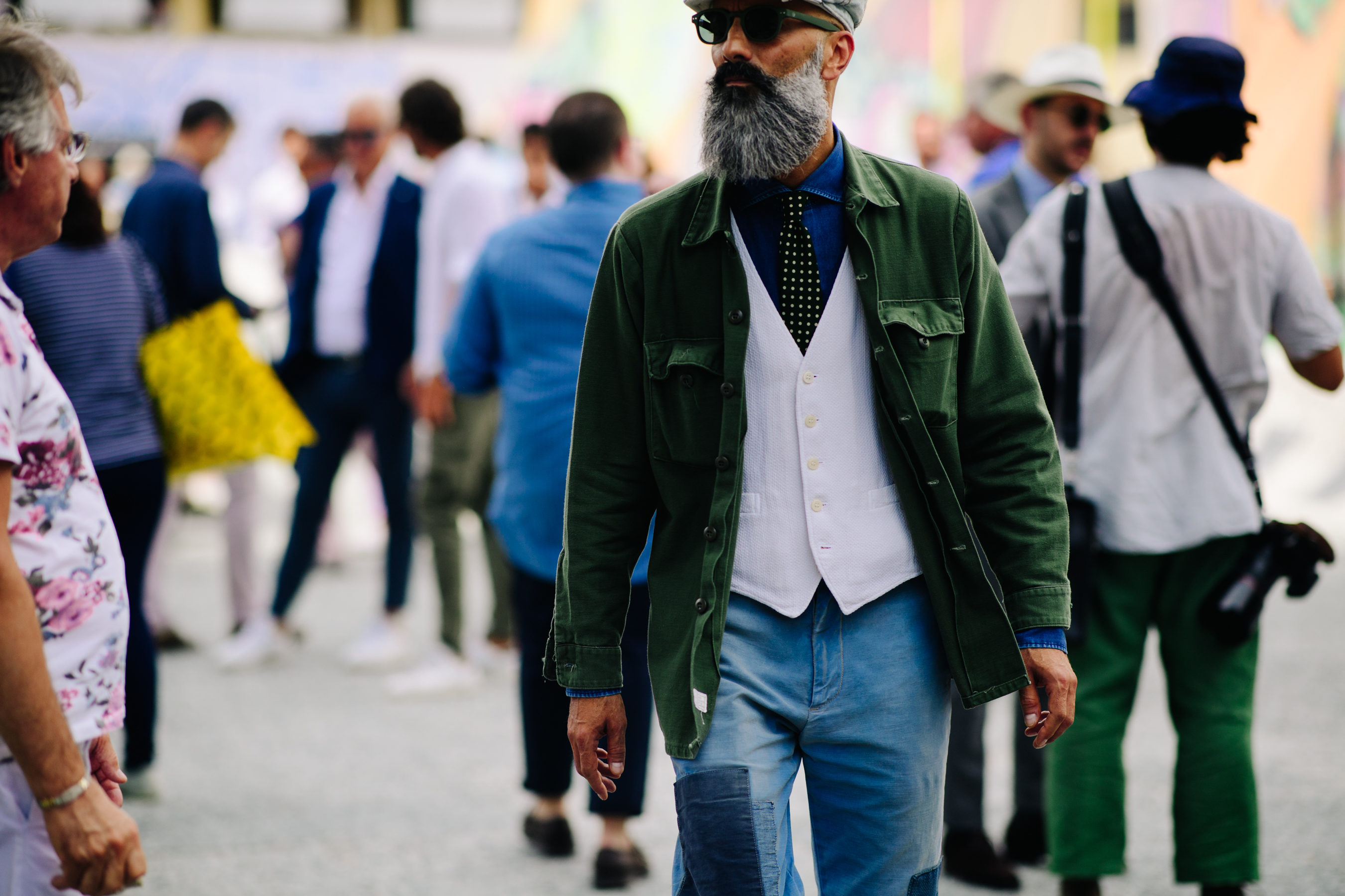 Man wearing a green denim jacket