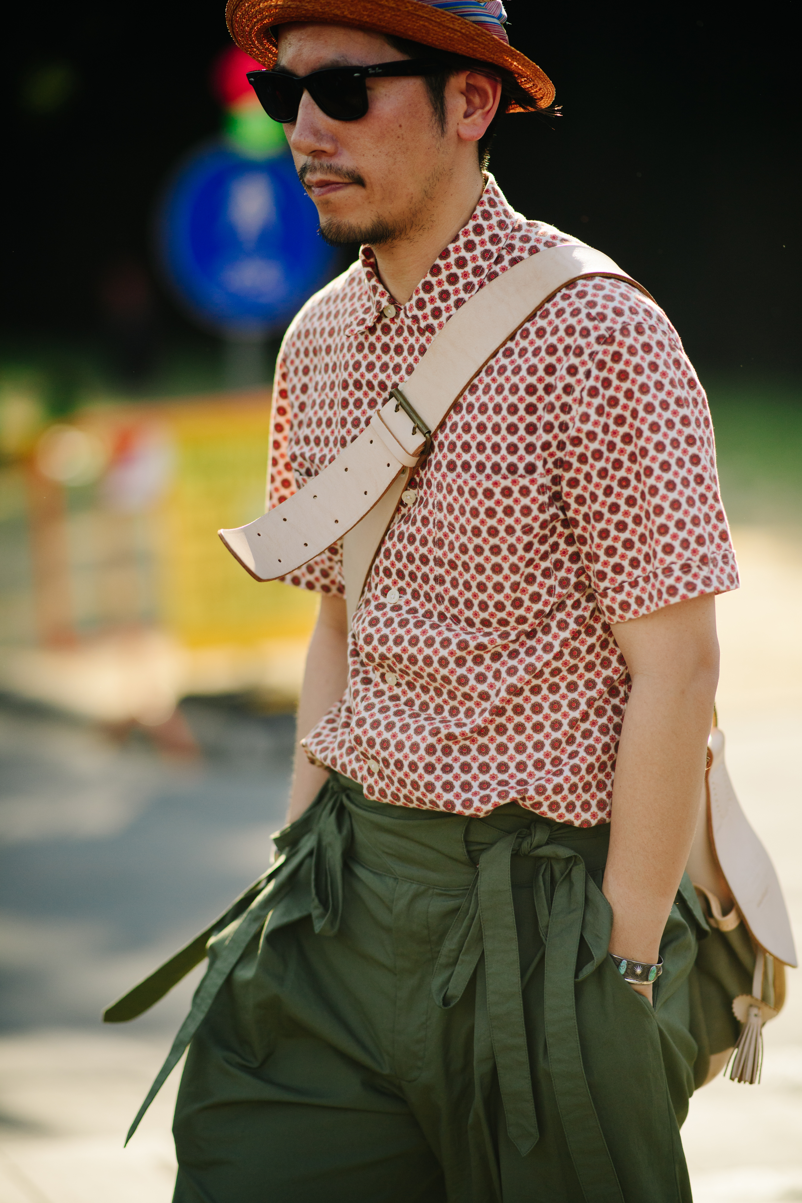 Man wearing dark green pants