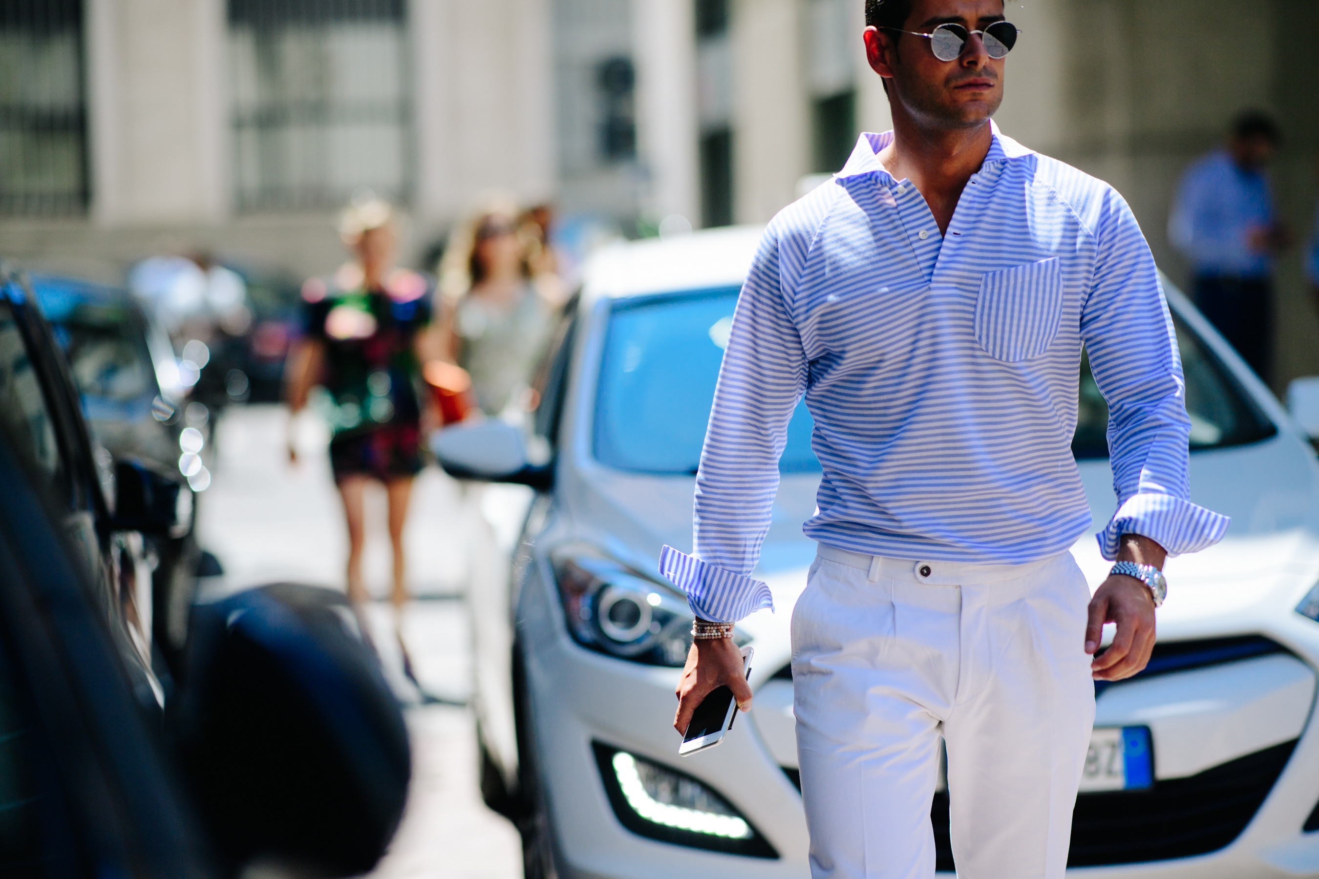 Man wearing a blue striped shirt