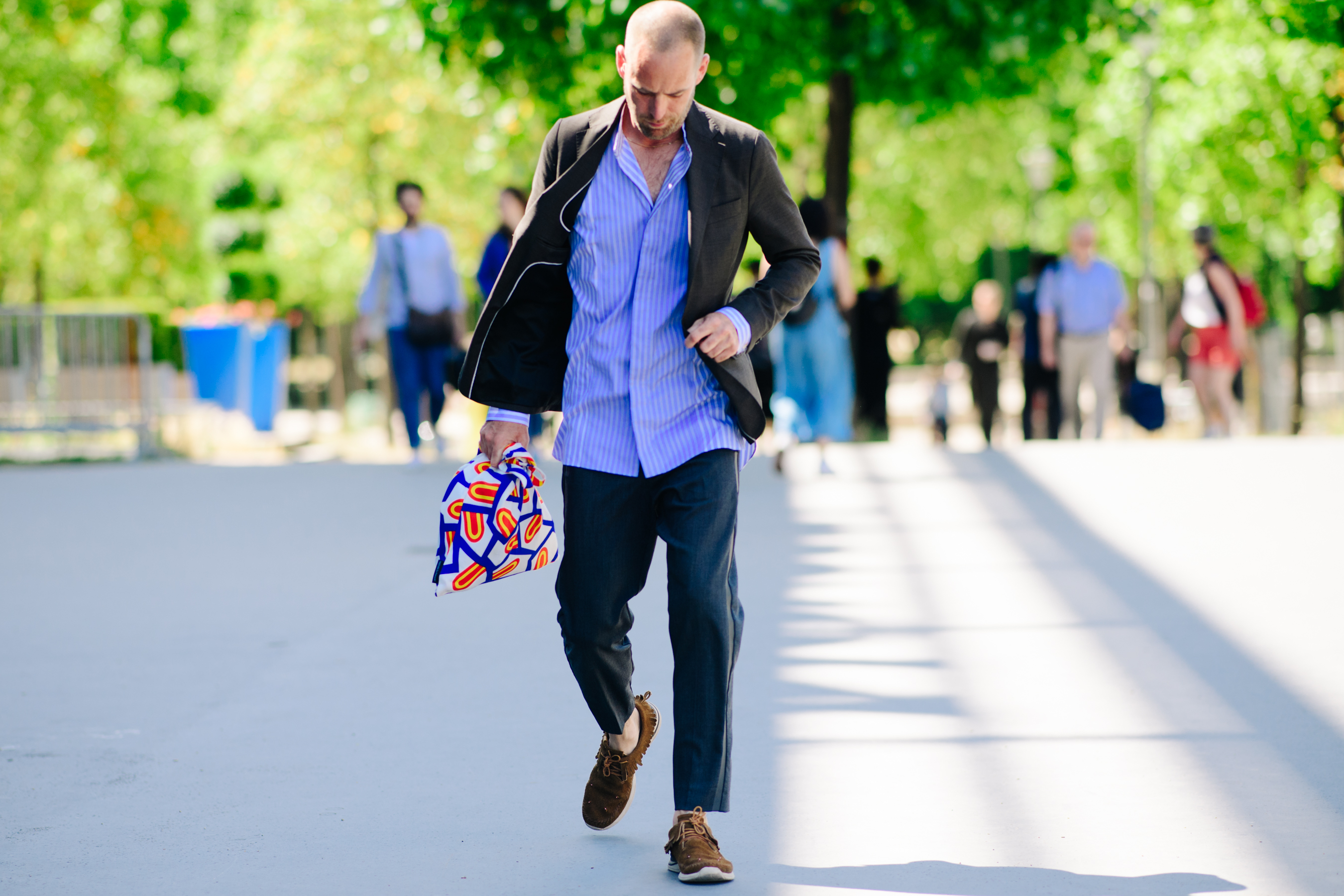Man wearing a blue striped shirt