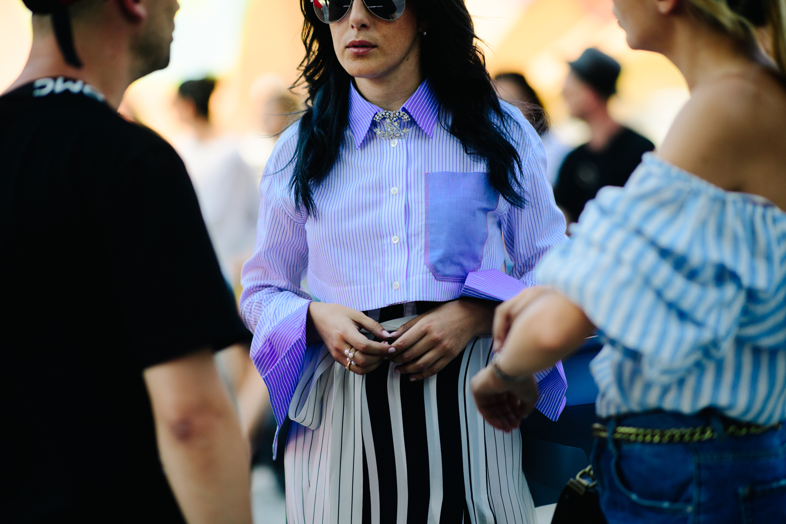 Italian PR director wearing blue shirt