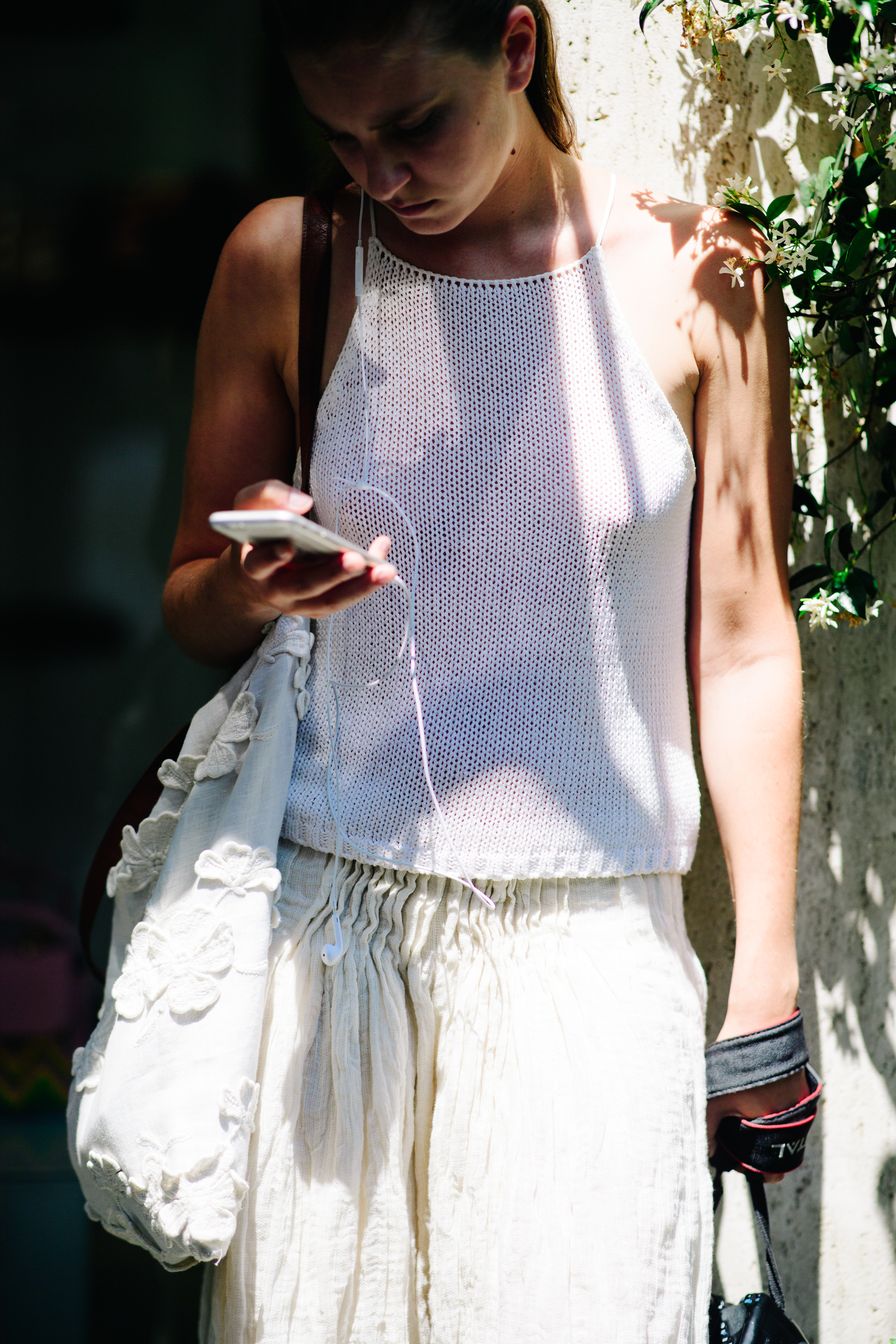 Photographer wearing a white skirt