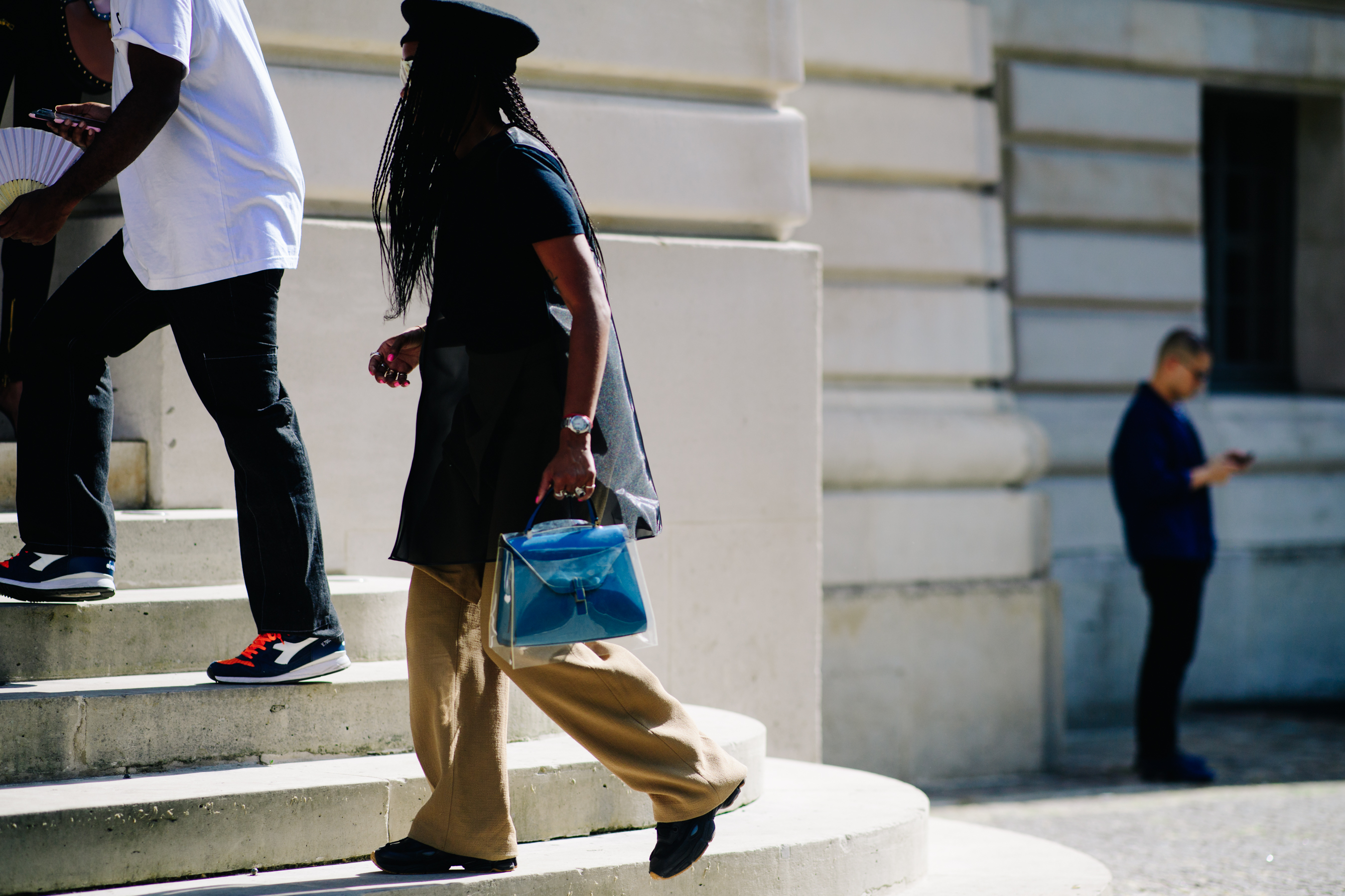 Woman wearing Raf Simons Adidas sneakers
