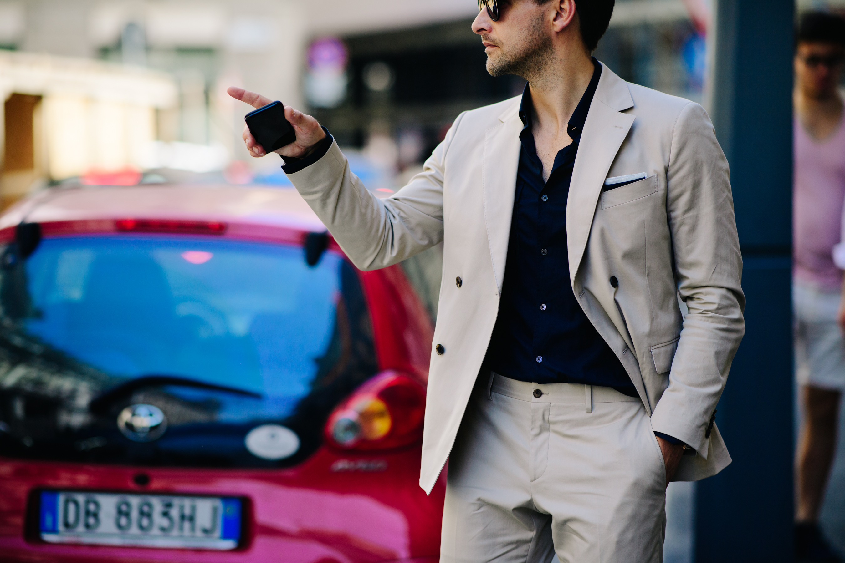 Man wearing a beige suit