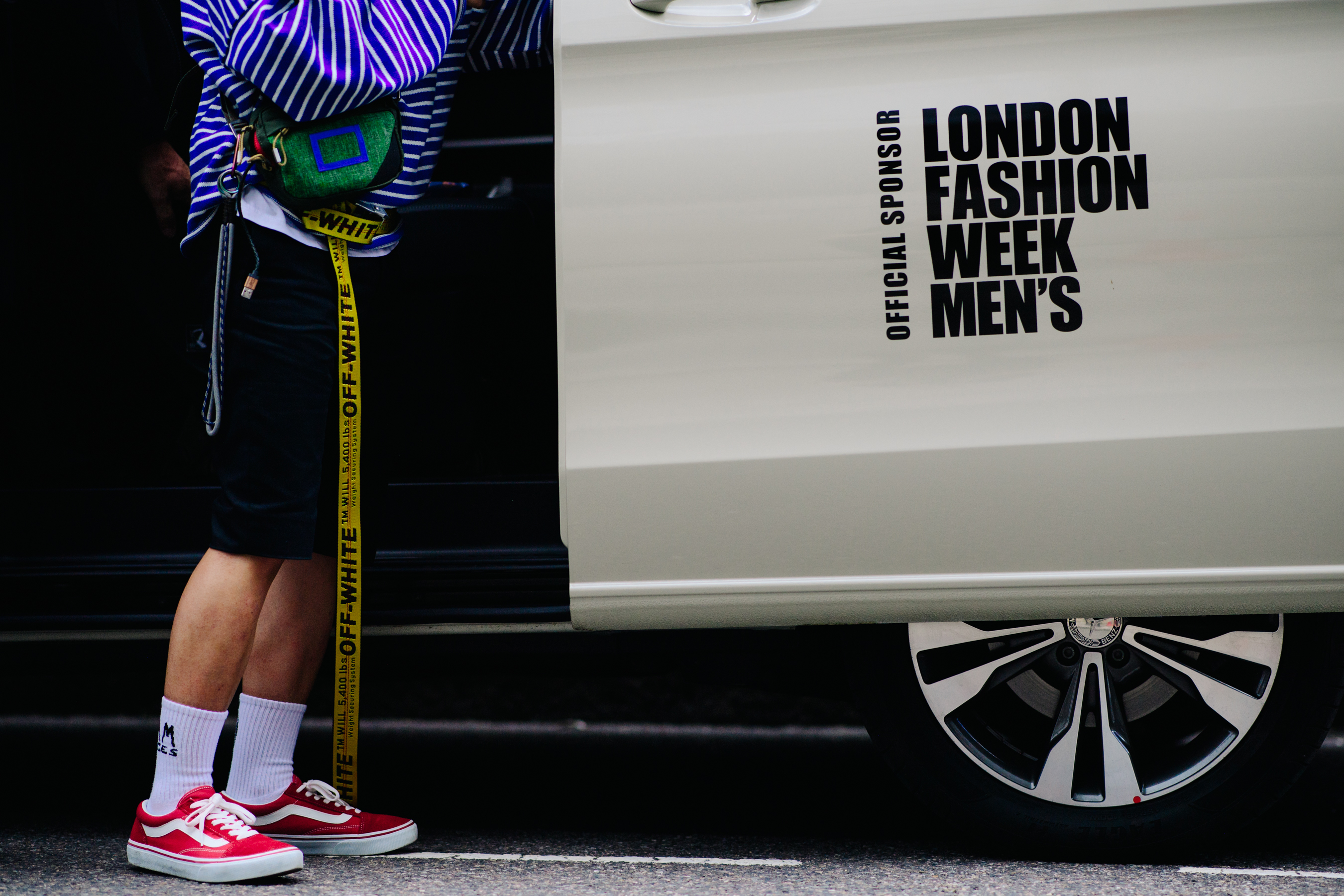 Man wearing Off-White and Vans