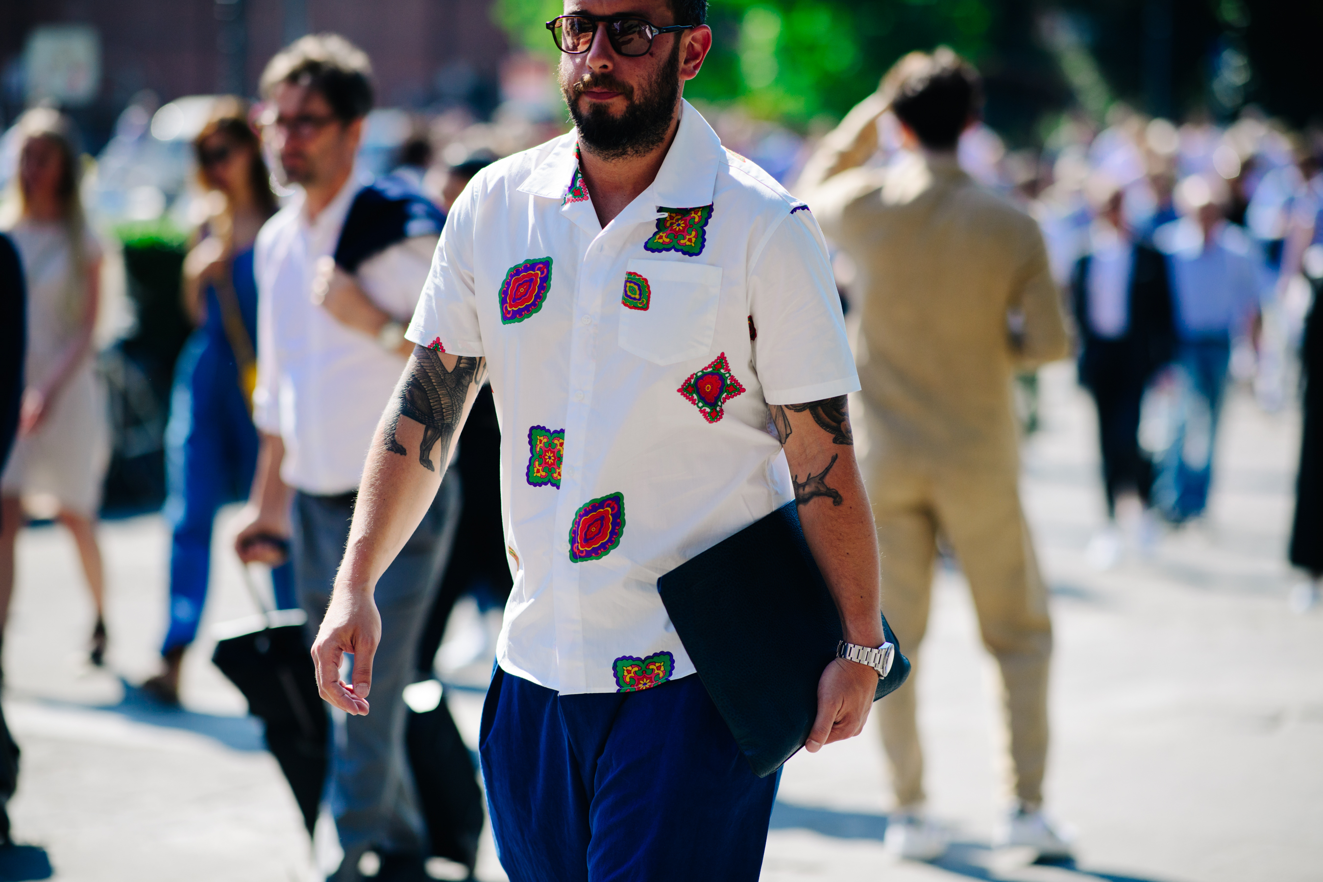 Man wearing white shirt with print