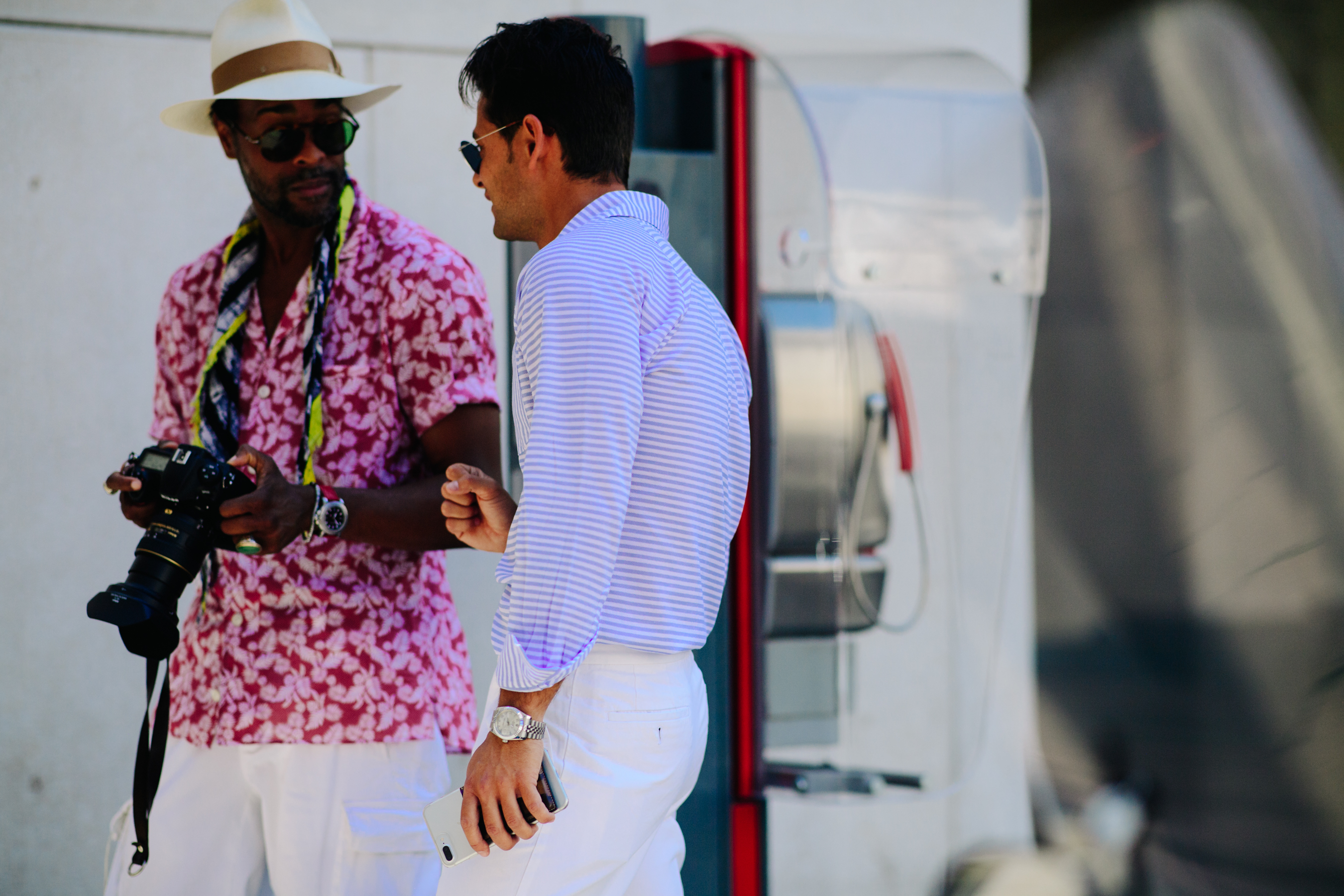 Two men wearing colourful shirt