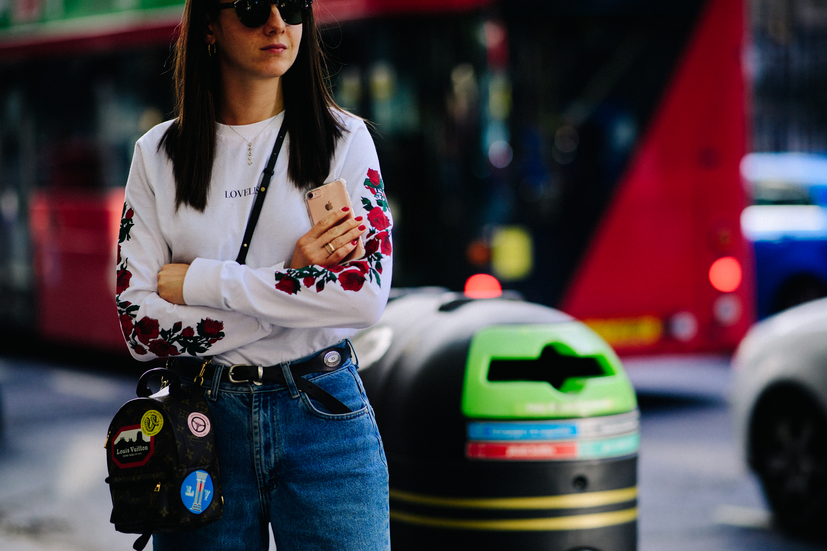 Girl wearing Louis Vuitton backpack