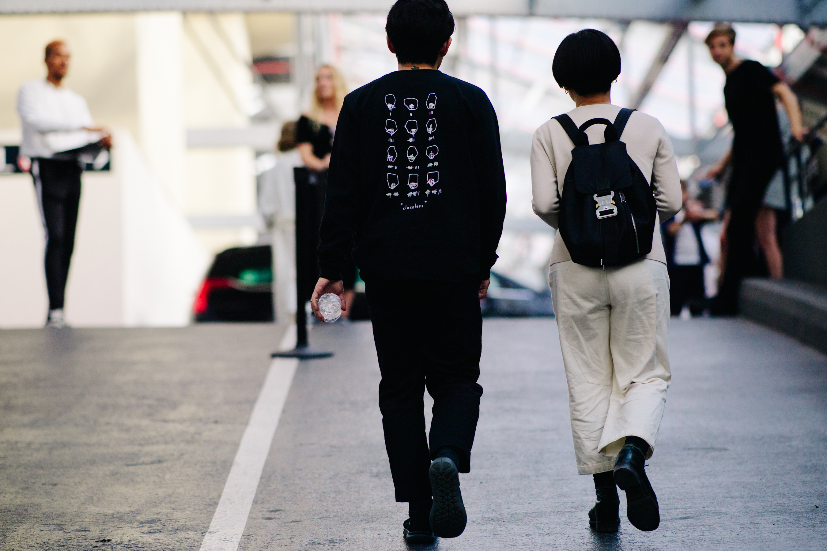 People wearing black casual shoes