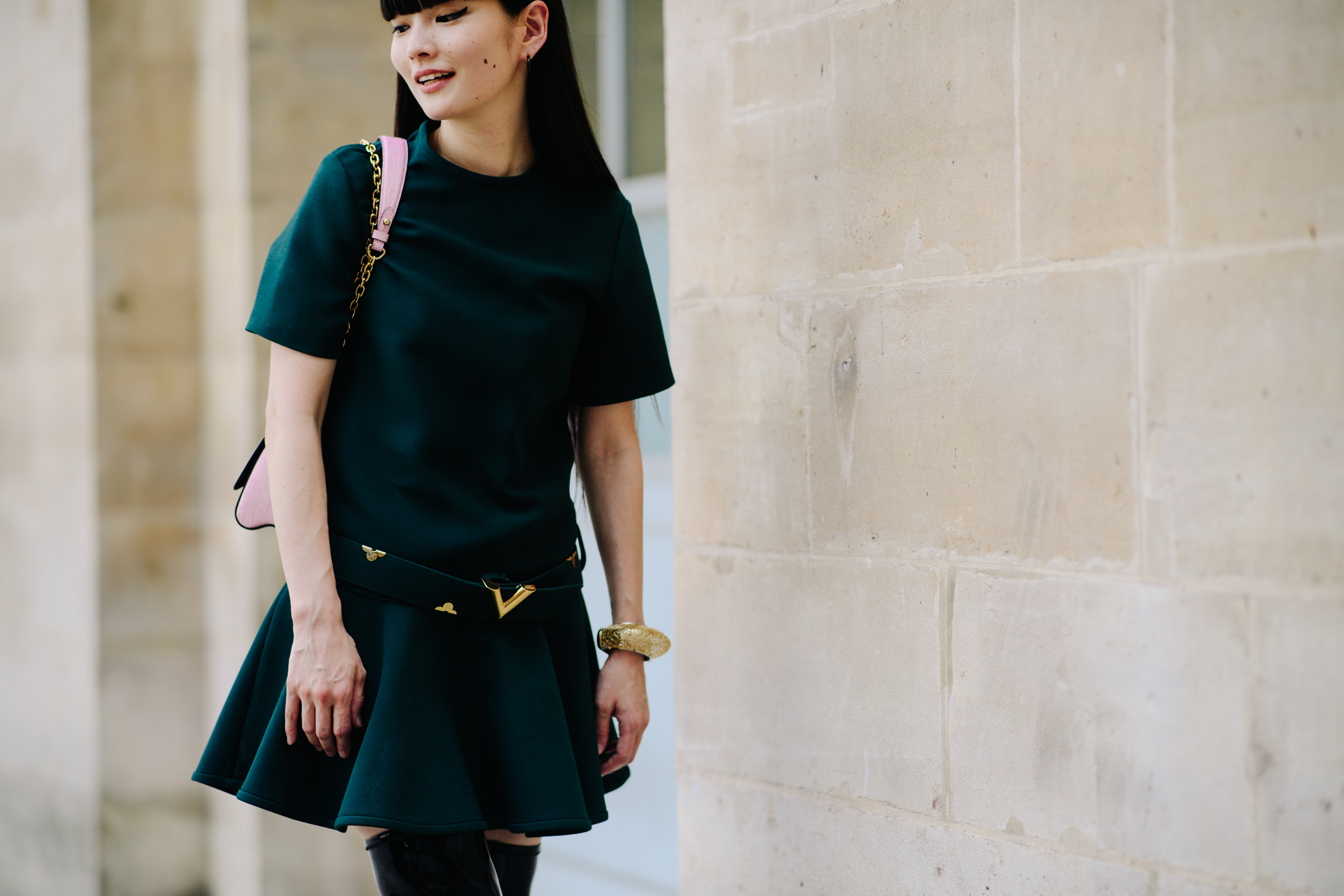 Woman wearing a dark green dress