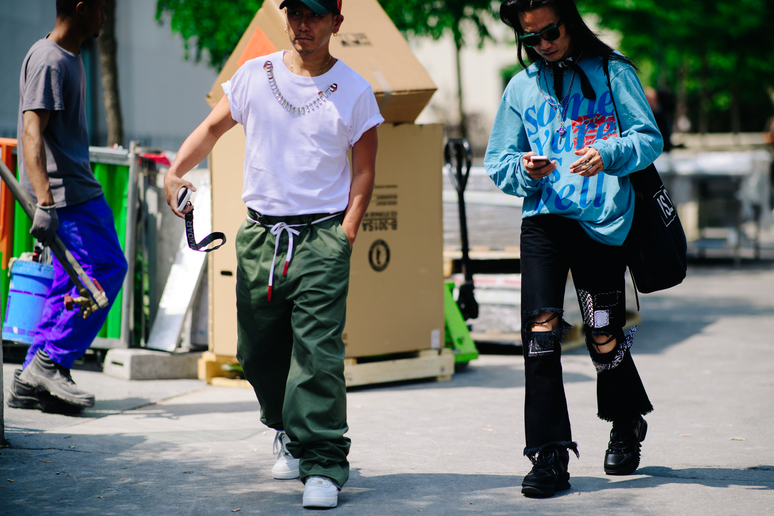 Two men wearing colorful outfits