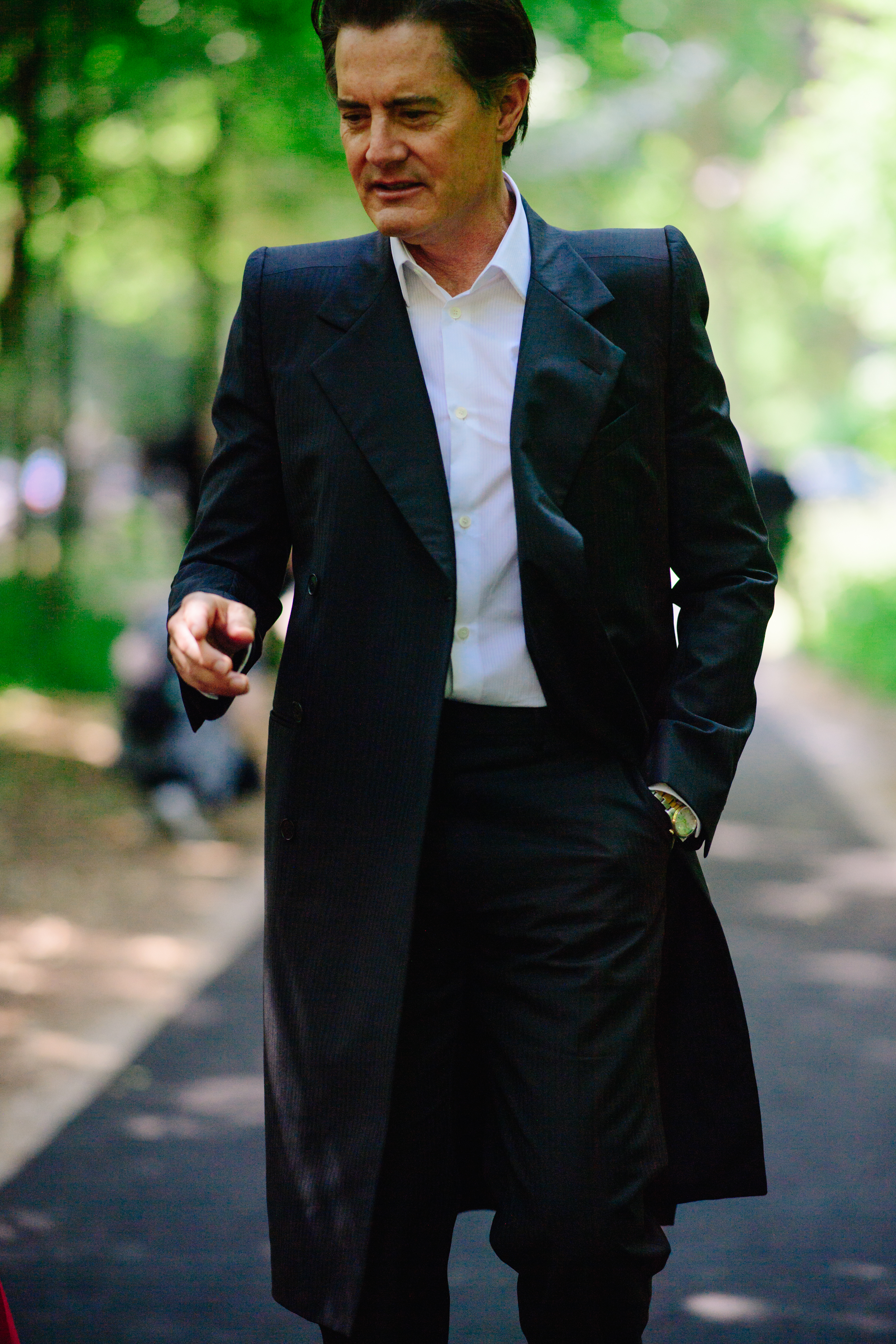 Actor wearing a black outfit