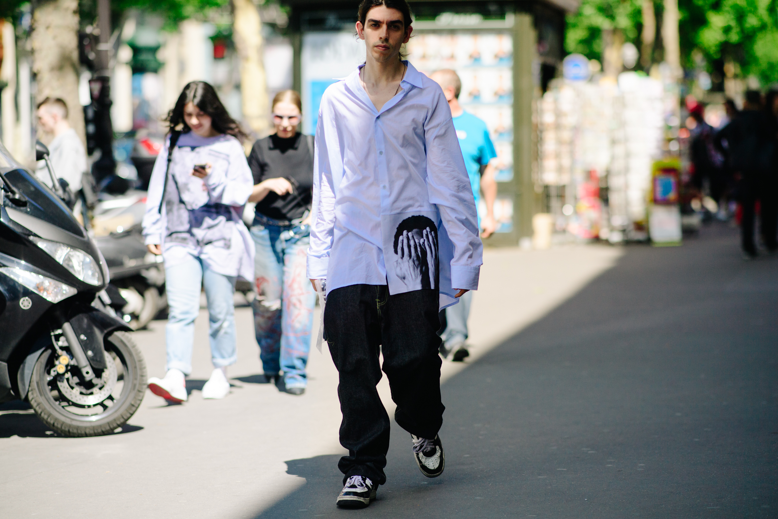 Dj wearing a Raf Simons shirt