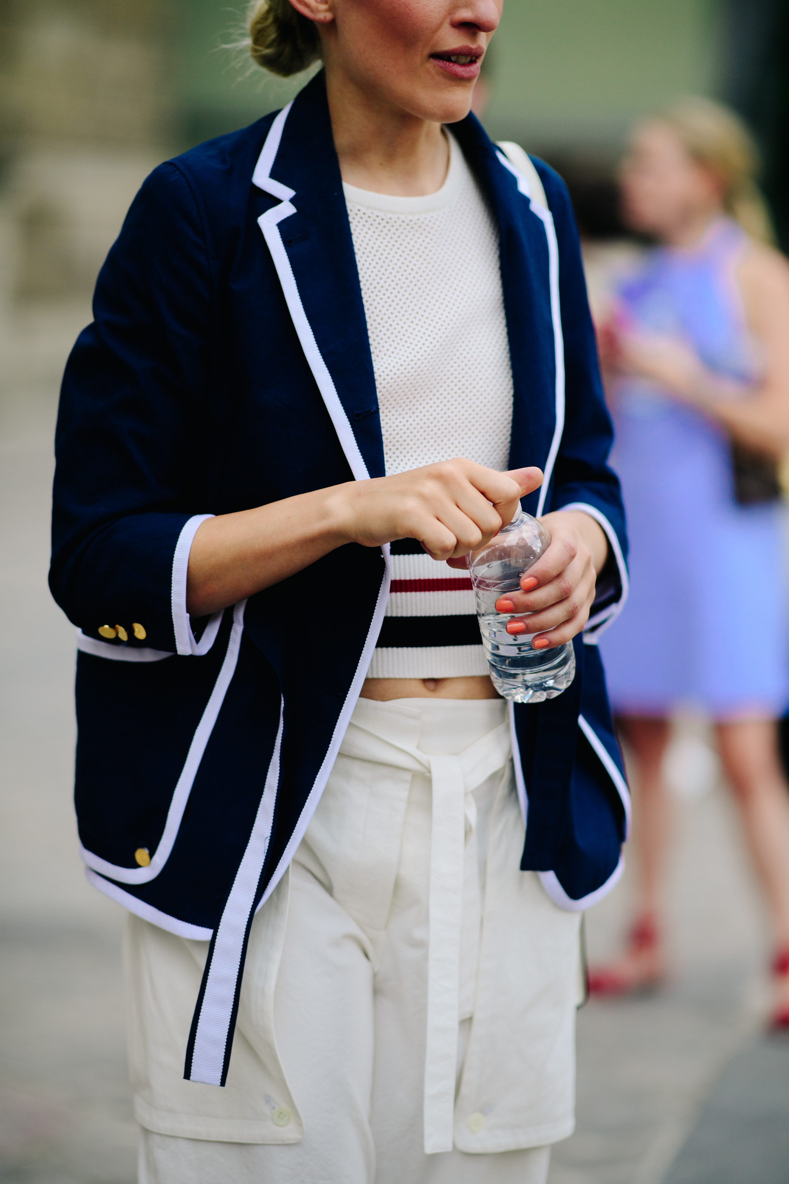 Woman wearing a dark navy jacket