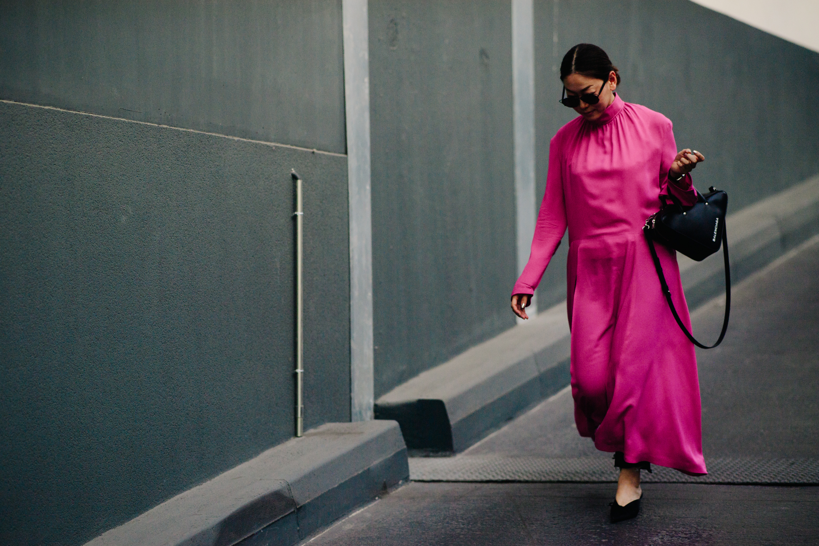 Woman carrying a Balenciaga bag