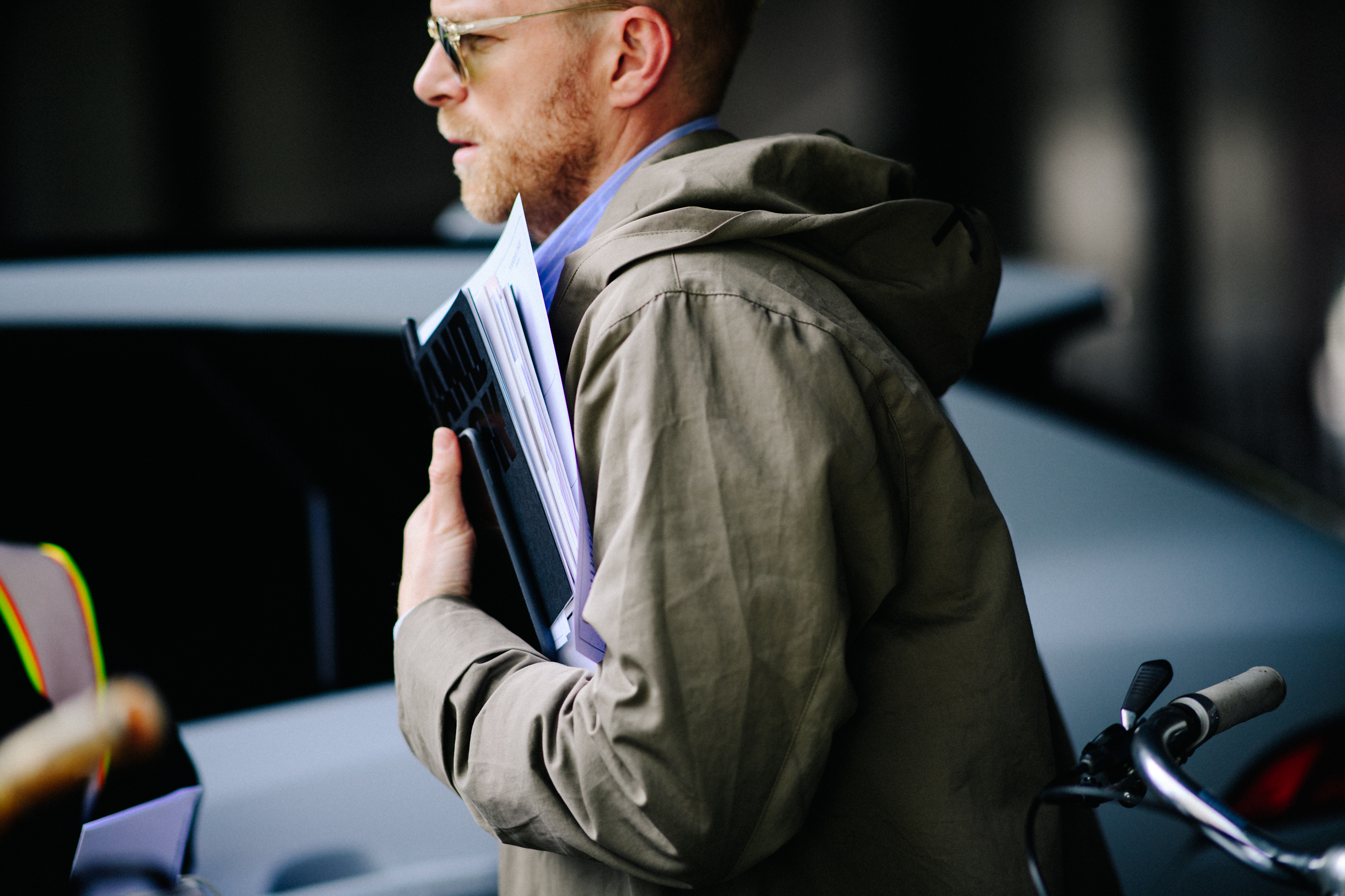 Buyer wearing beige trench coat