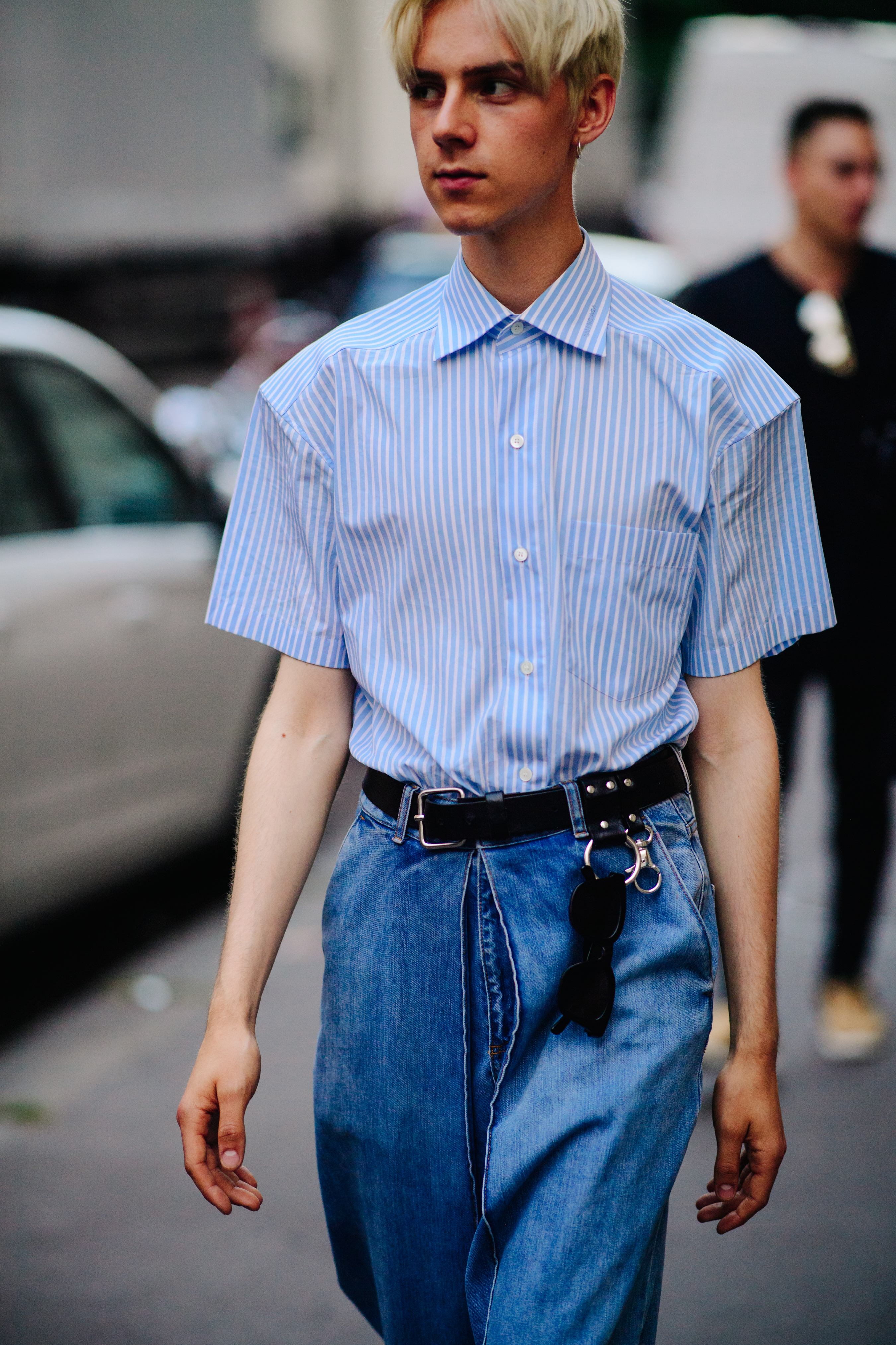 Man wearing a striped blue shirt