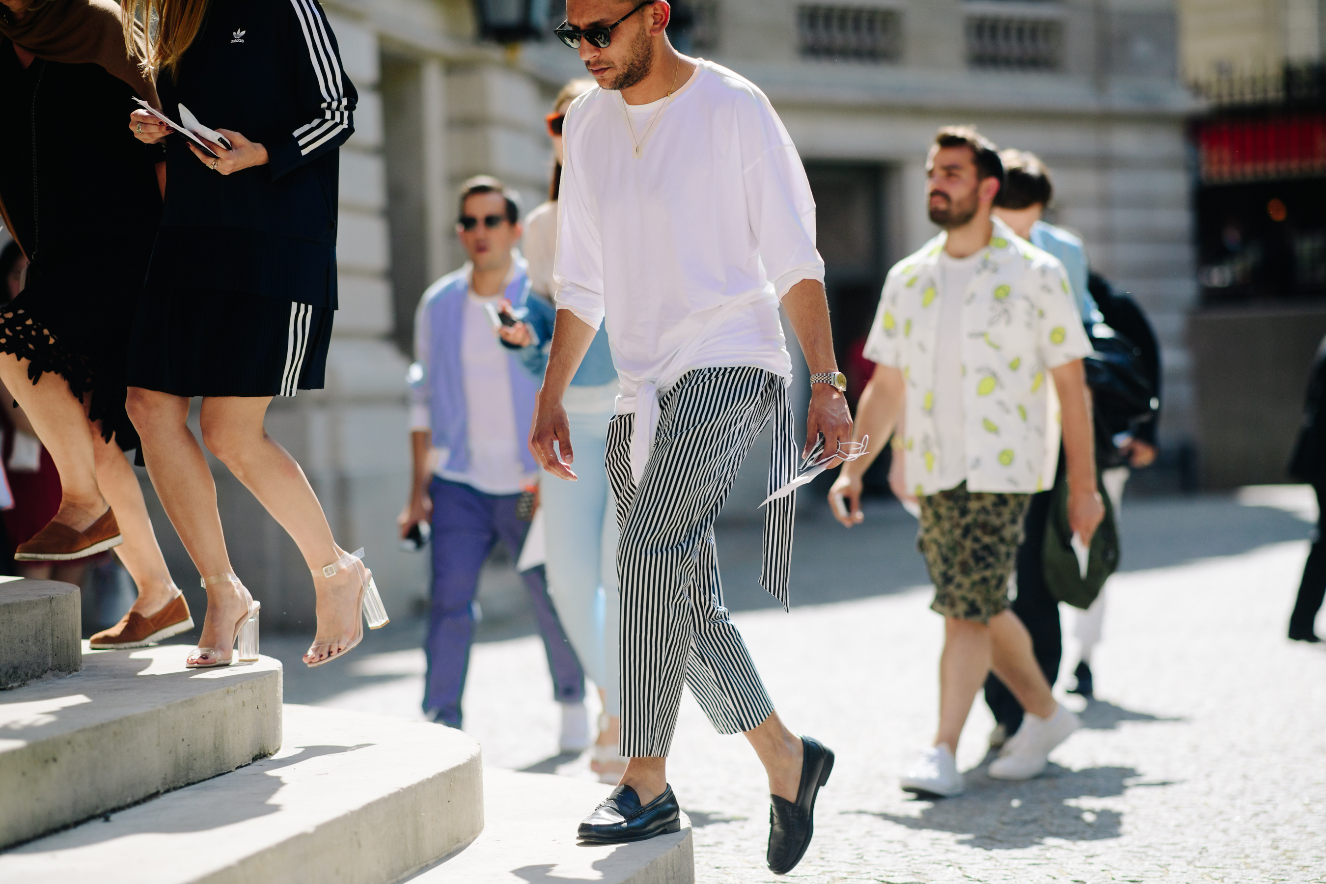 Man wearing striped trousers