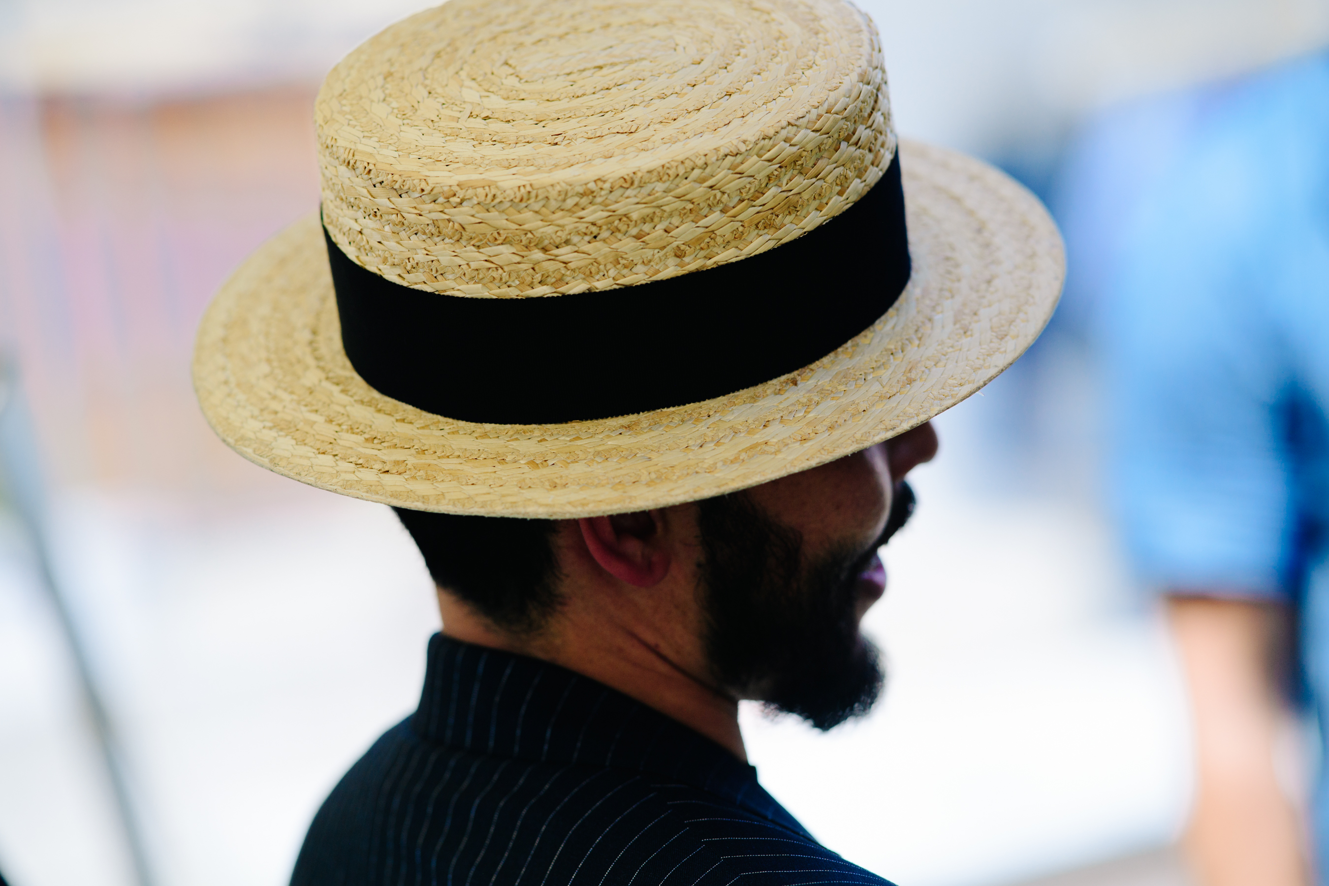 Man wearing a yellow straw hat