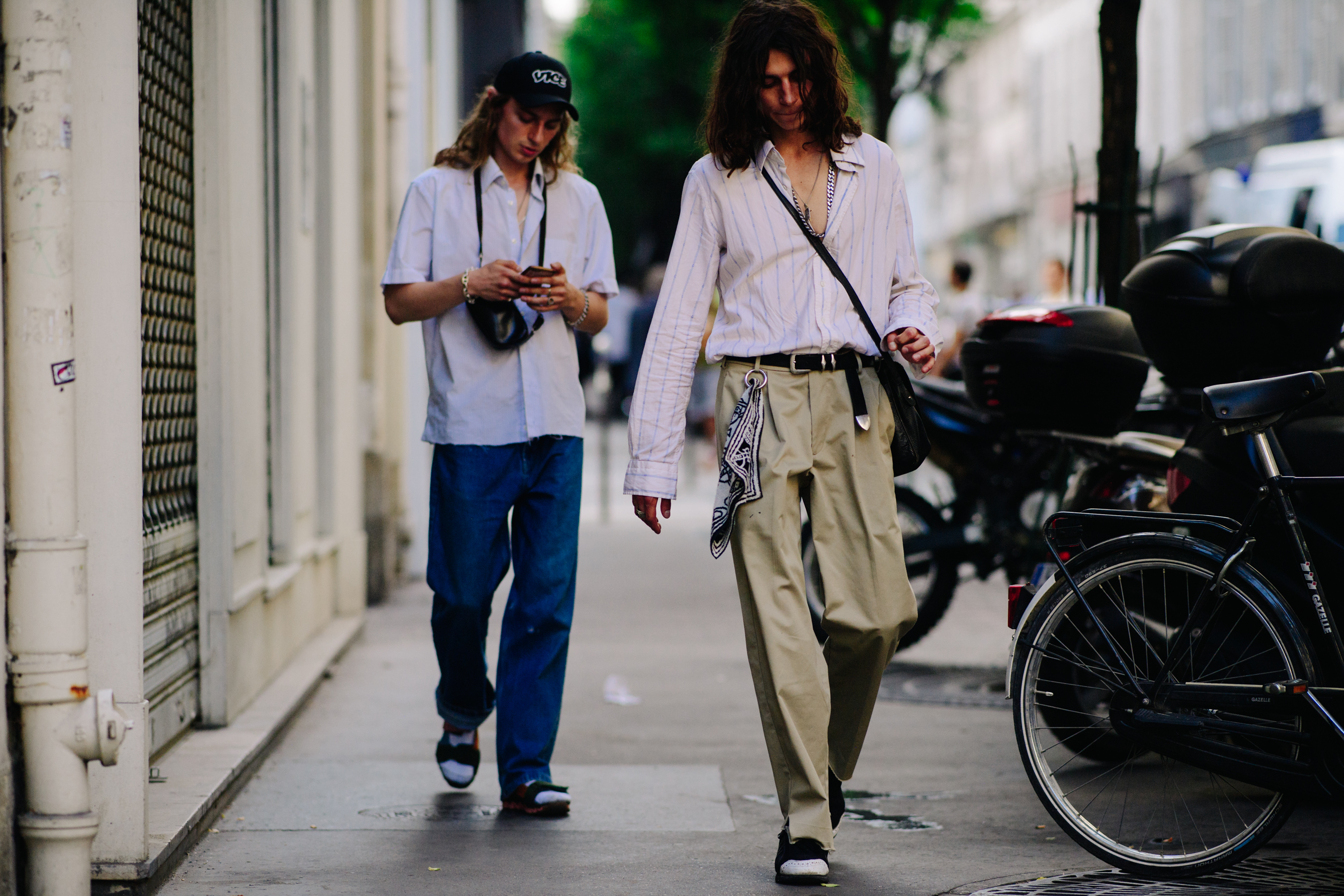 Two brothers wearing informal outfits