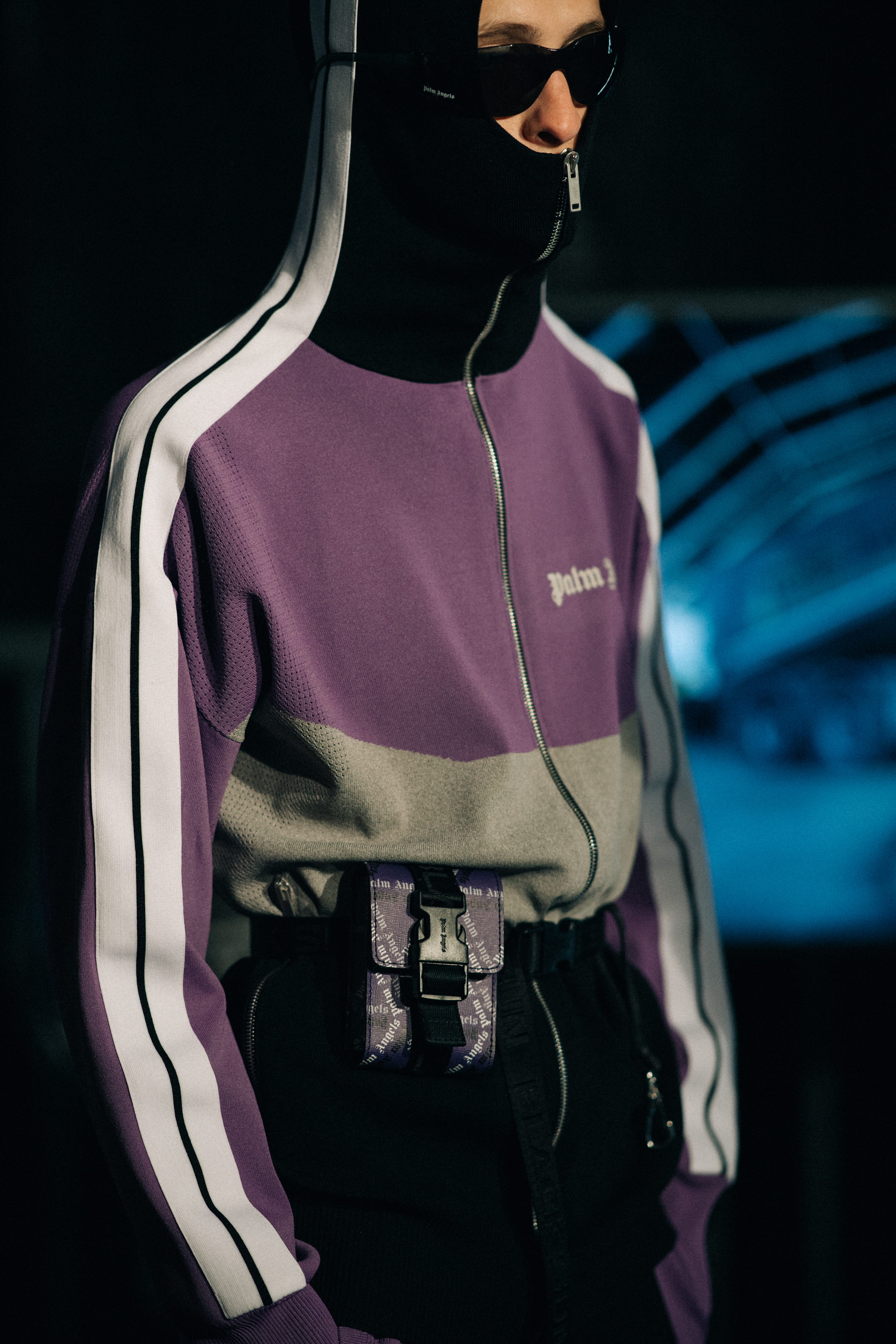 Male model wearing a purple jacket
