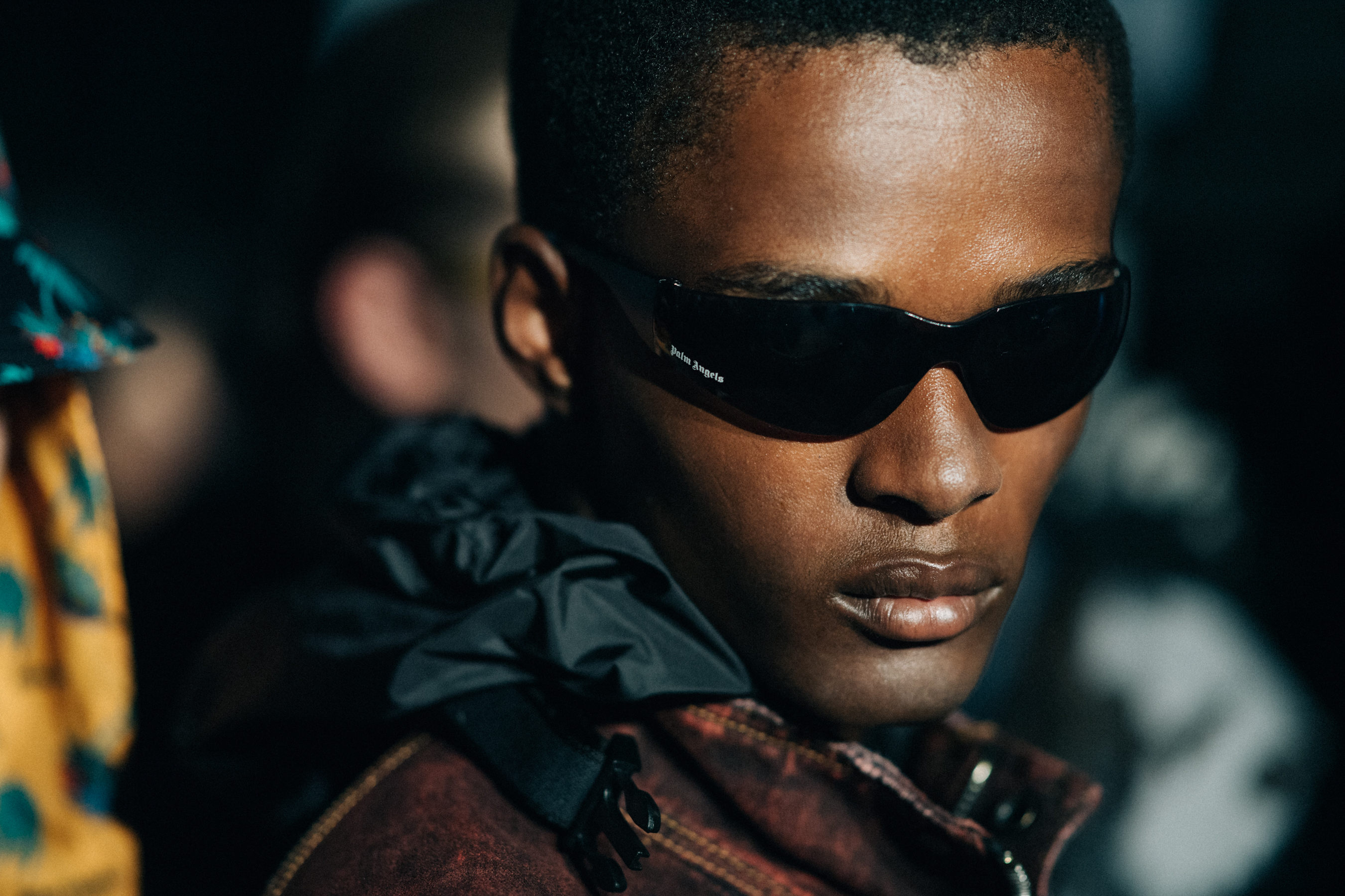 Male model wearing black shades