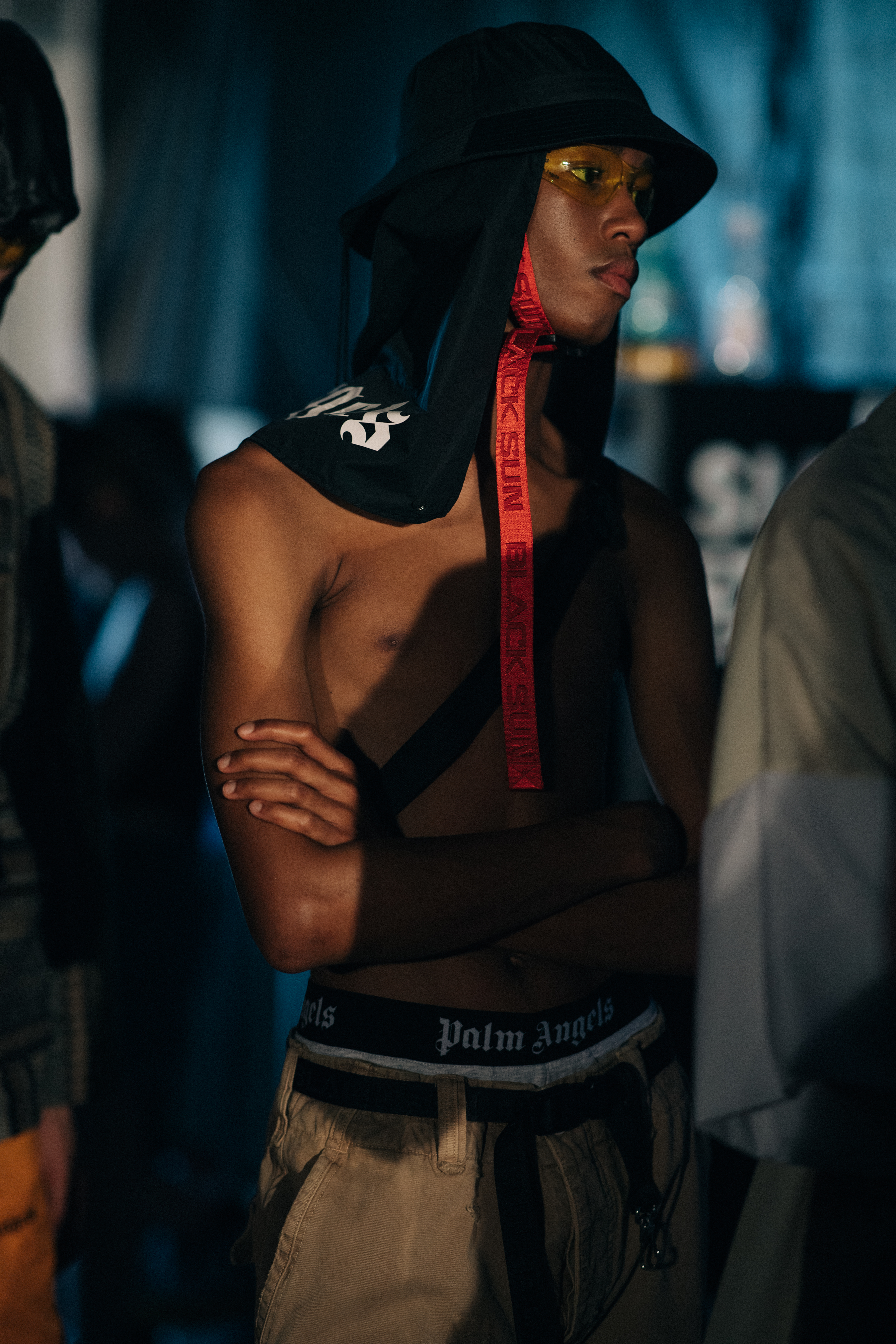 Shirtless young male model backstage